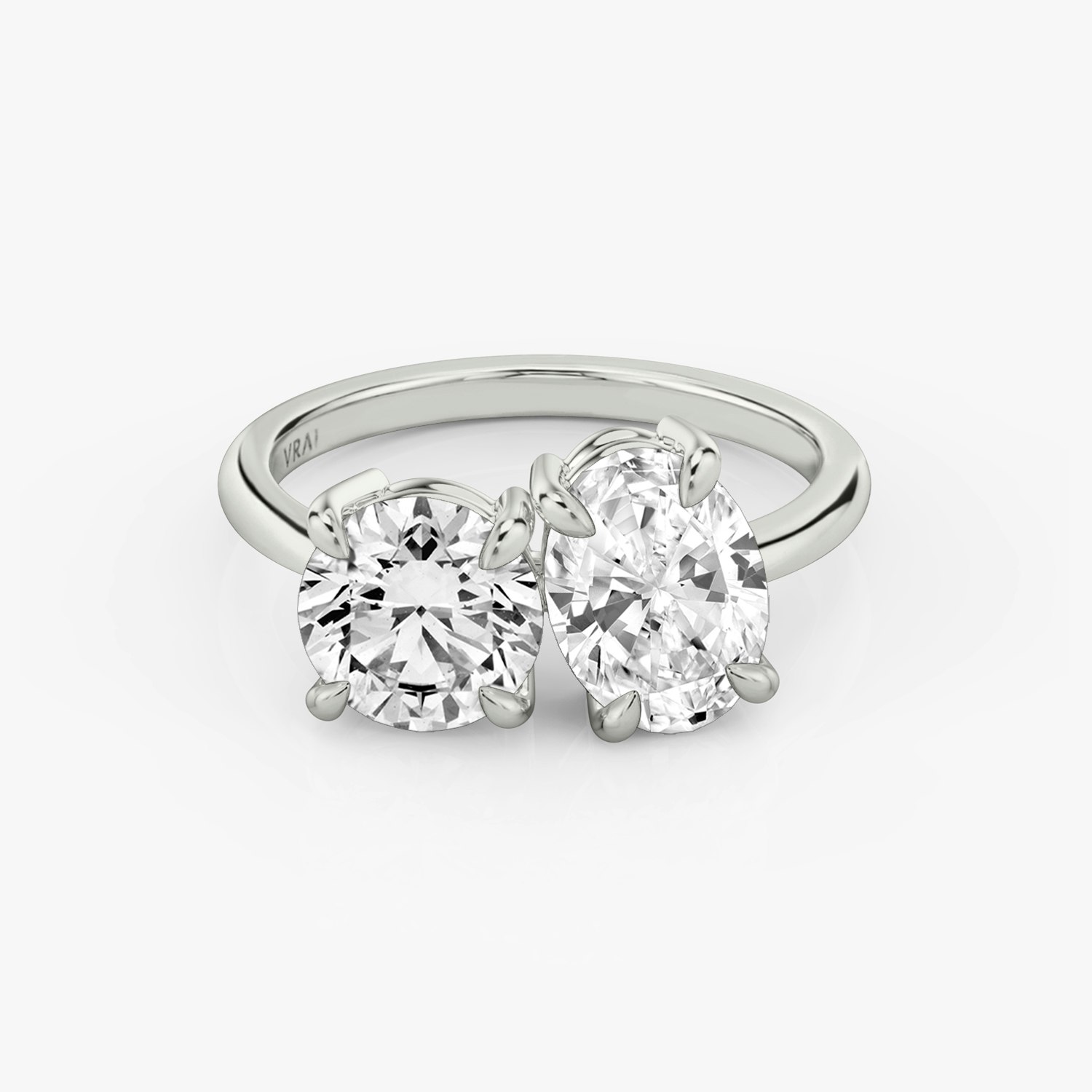 The Toi et Moi Round Brilliant and Oval Engagement Ring | Platinum