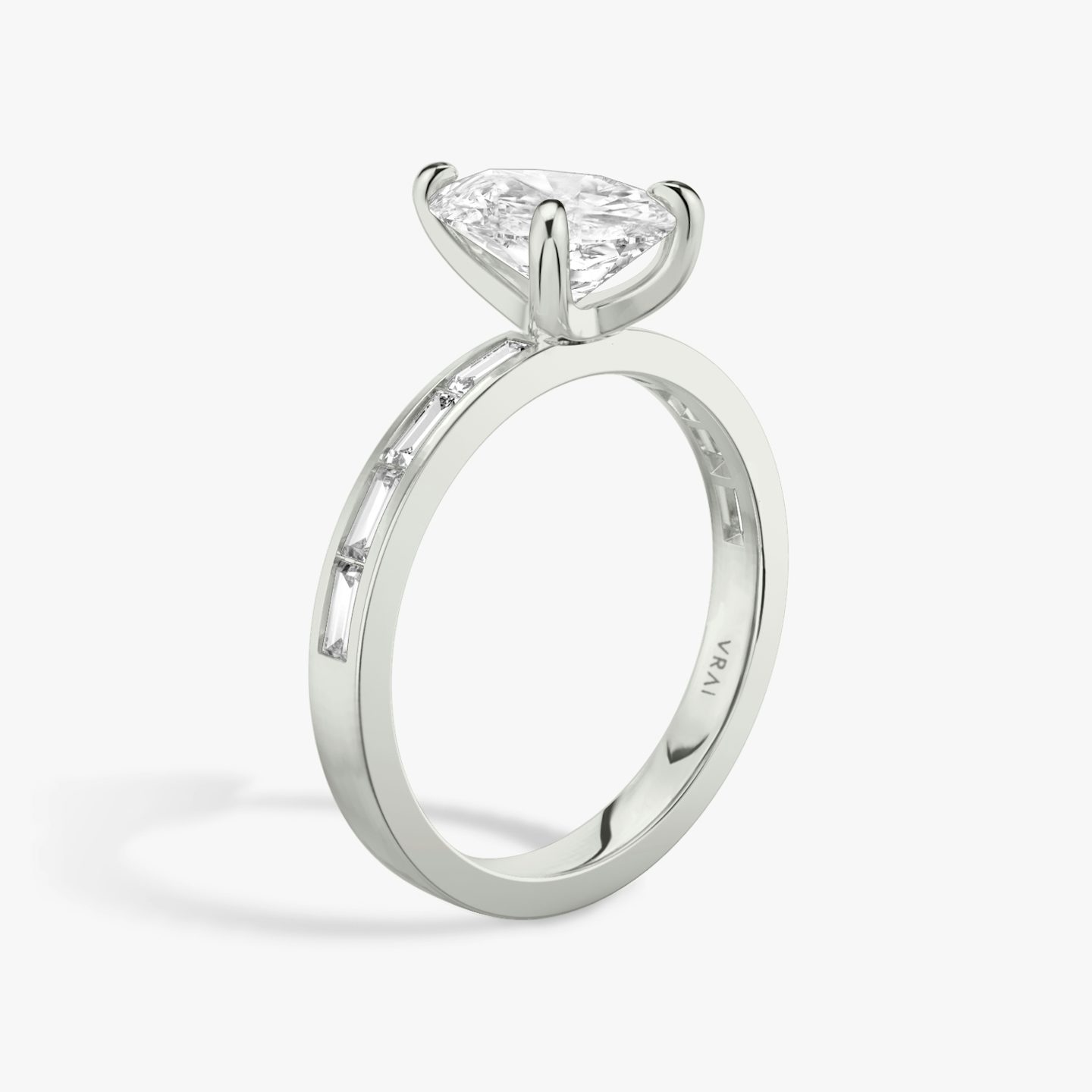 The Devotion | Pear | Platinum | Band: Pavé | Band stone shape: Baguette | Band: Original | Diamond orientation: vertical | Carat weight: See full inventory