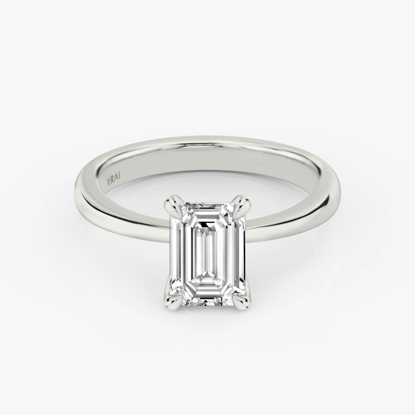 The Tapered Classic | emerald | 18k | white-gold | bandAccent: plain | diamondOrientation: vertical | caratWeight: other