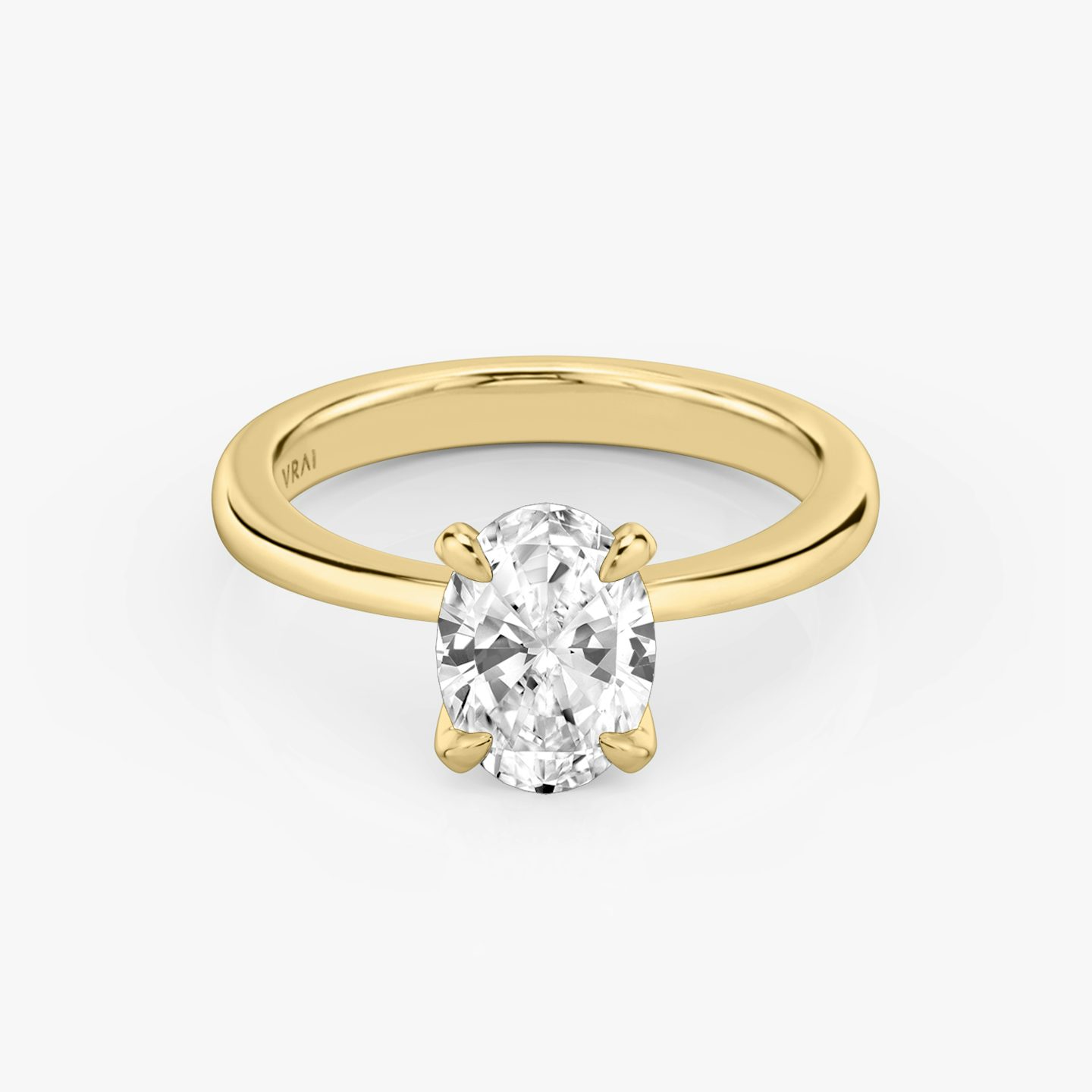 The Tapered Classic | Oval | 18k | 18k Yellow Gold | Band: Plain | Diamond orientation: vertical | Carat weight: See full inventory