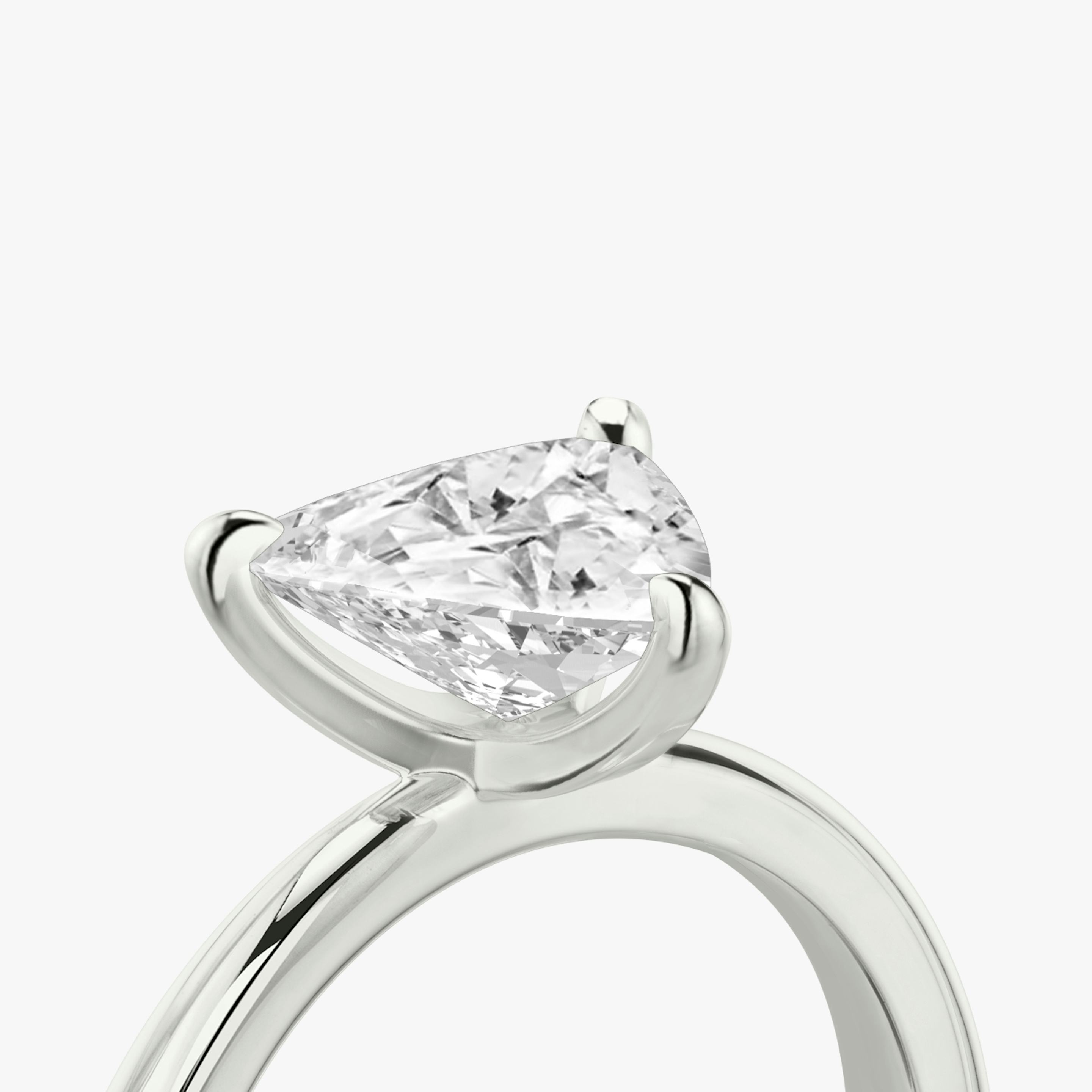 The Tapered Classic | Trillion | 18k | 18k White Gold | Band: Plain | Diamond orientation: vertical | Carat weight: See full inventory