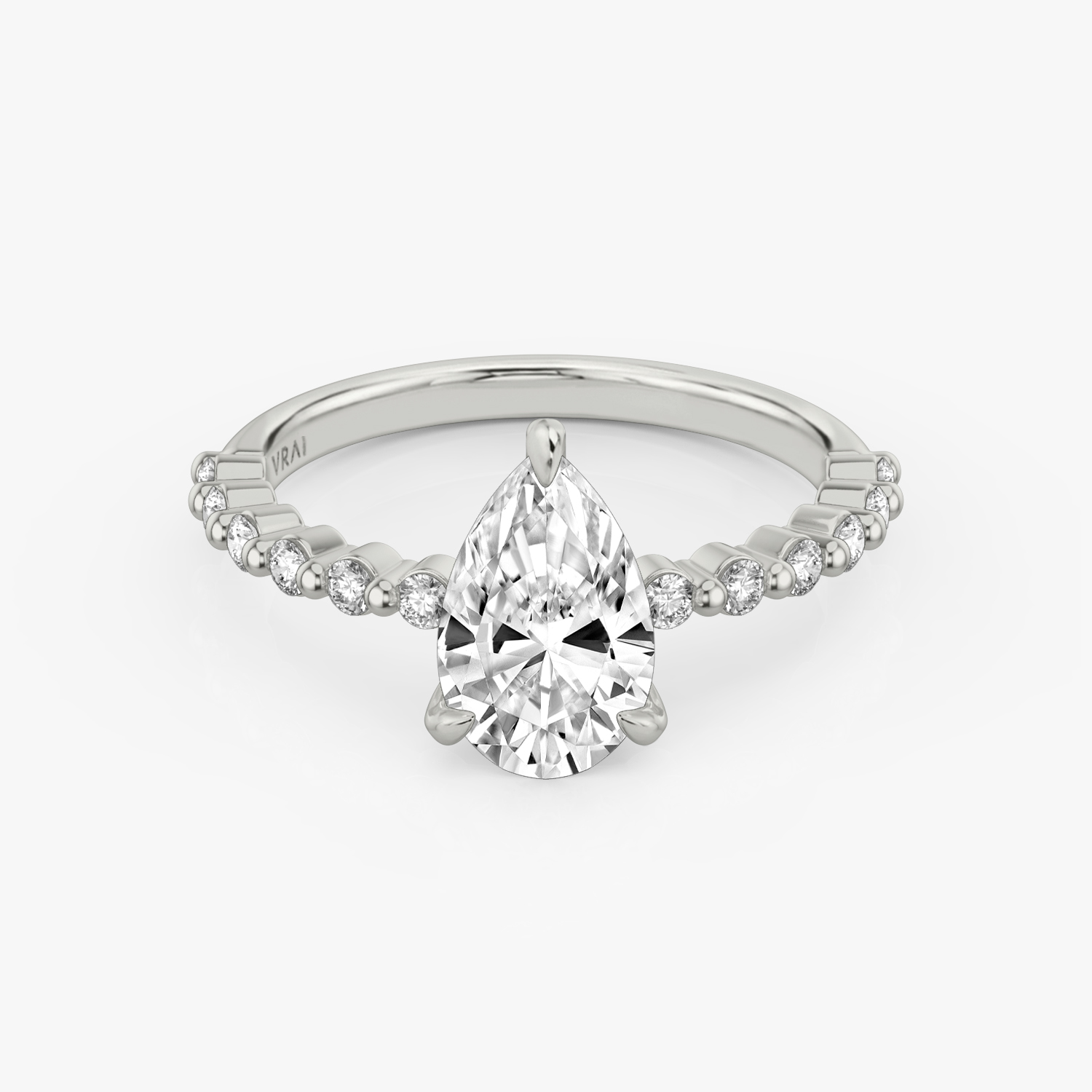 The Single Shared Prong Pear Engagement Ring in Platinum VRAI