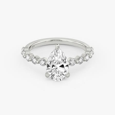single shared prong pear diamond ring