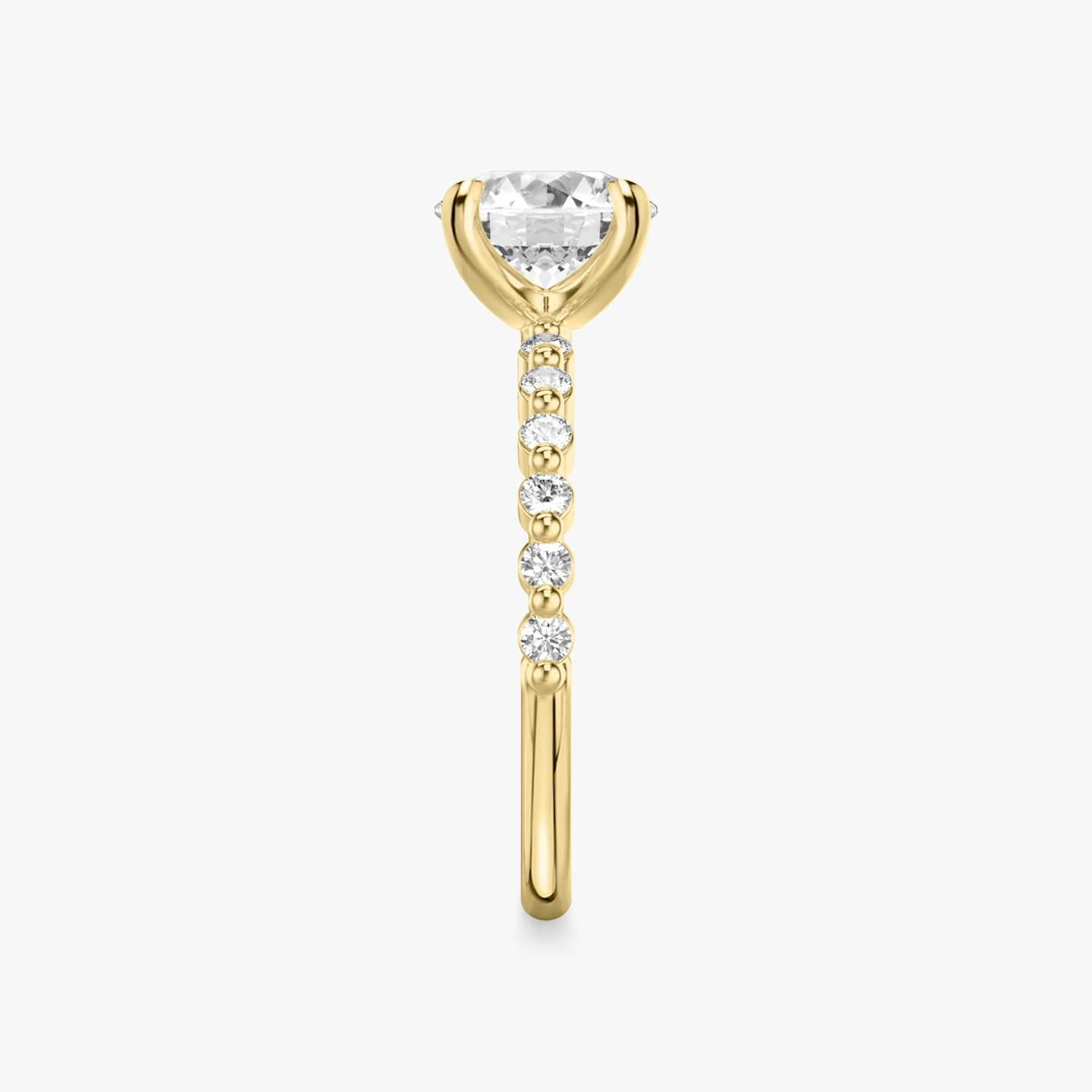 The Single Shared Prong | Round Brilliant | 18k | 18k Yellow Gold | Band: Plain | Band: Original | Carat weight: See full inventory | Diamond orientation: vertical