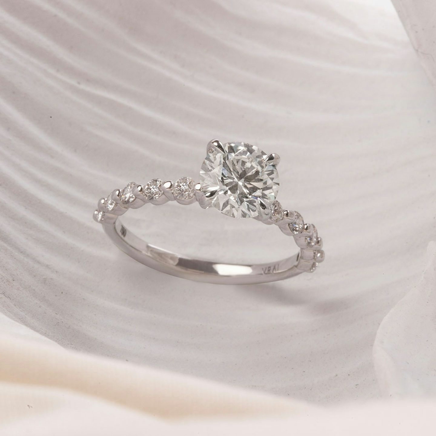 The Single Shared Prong | Round Brilliant | Platinum | Carat weight: See full inventory | Band: Original | Diamond orientation: vertical