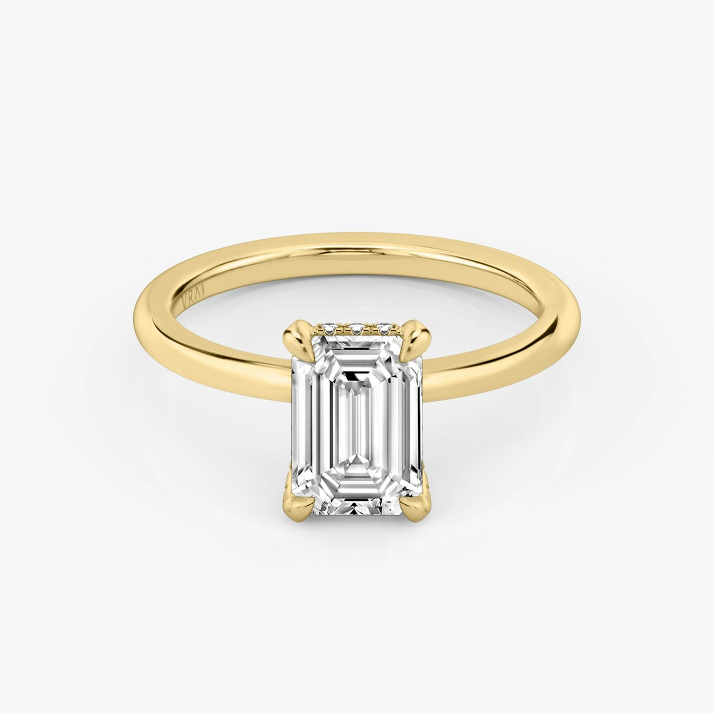 The Classic Hidden Halo | Emerald | 18k | 18k Yellow Gold | Band: Plain | Prong style: Pavé | Diamond orientation: vertical | Carat weight: See full inventory