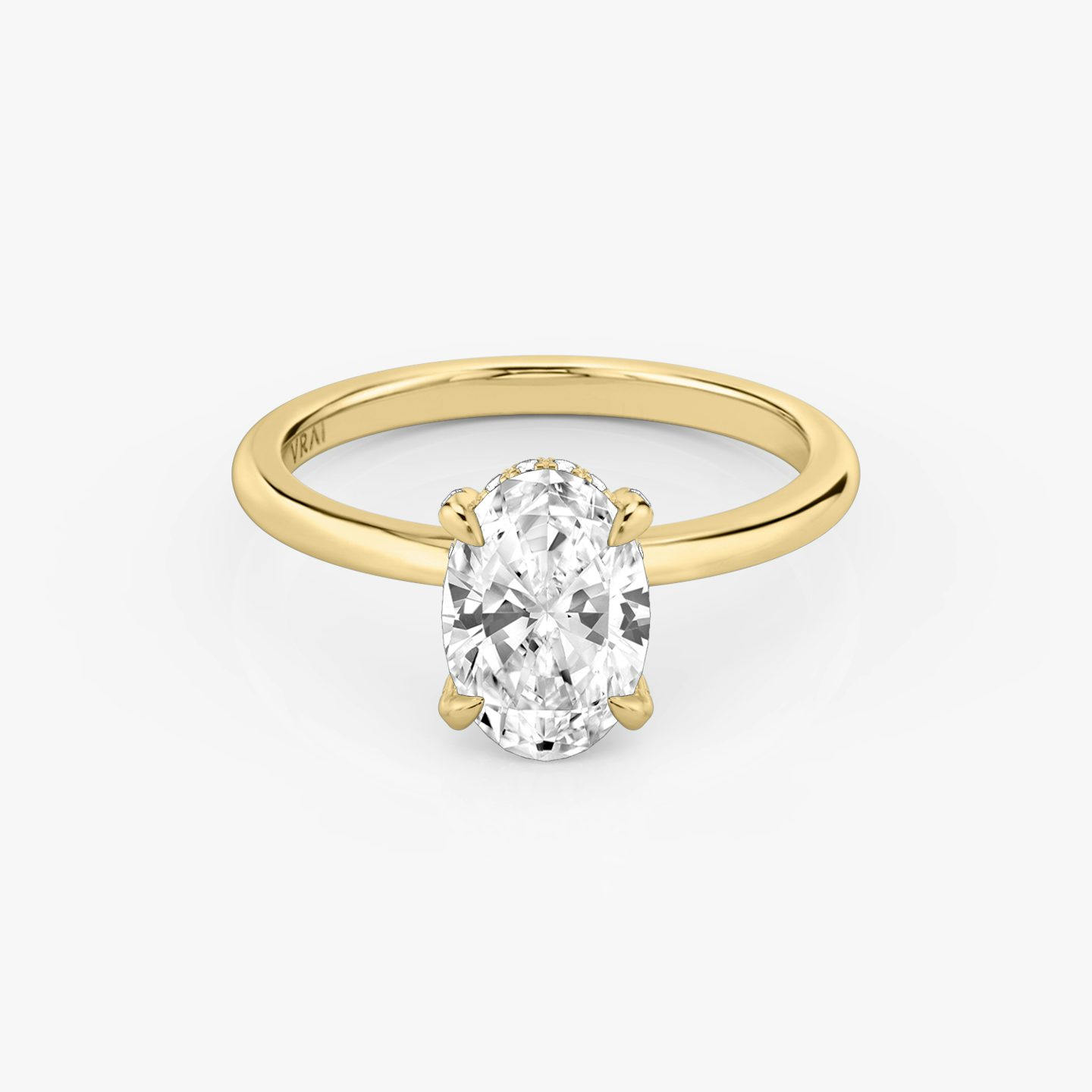 The Classic Hidden Halo | oval | 18k | yellow-gold | bandAccent: plain | prongStyle: pave | diamondOrientation: vertical | caratWeight: other