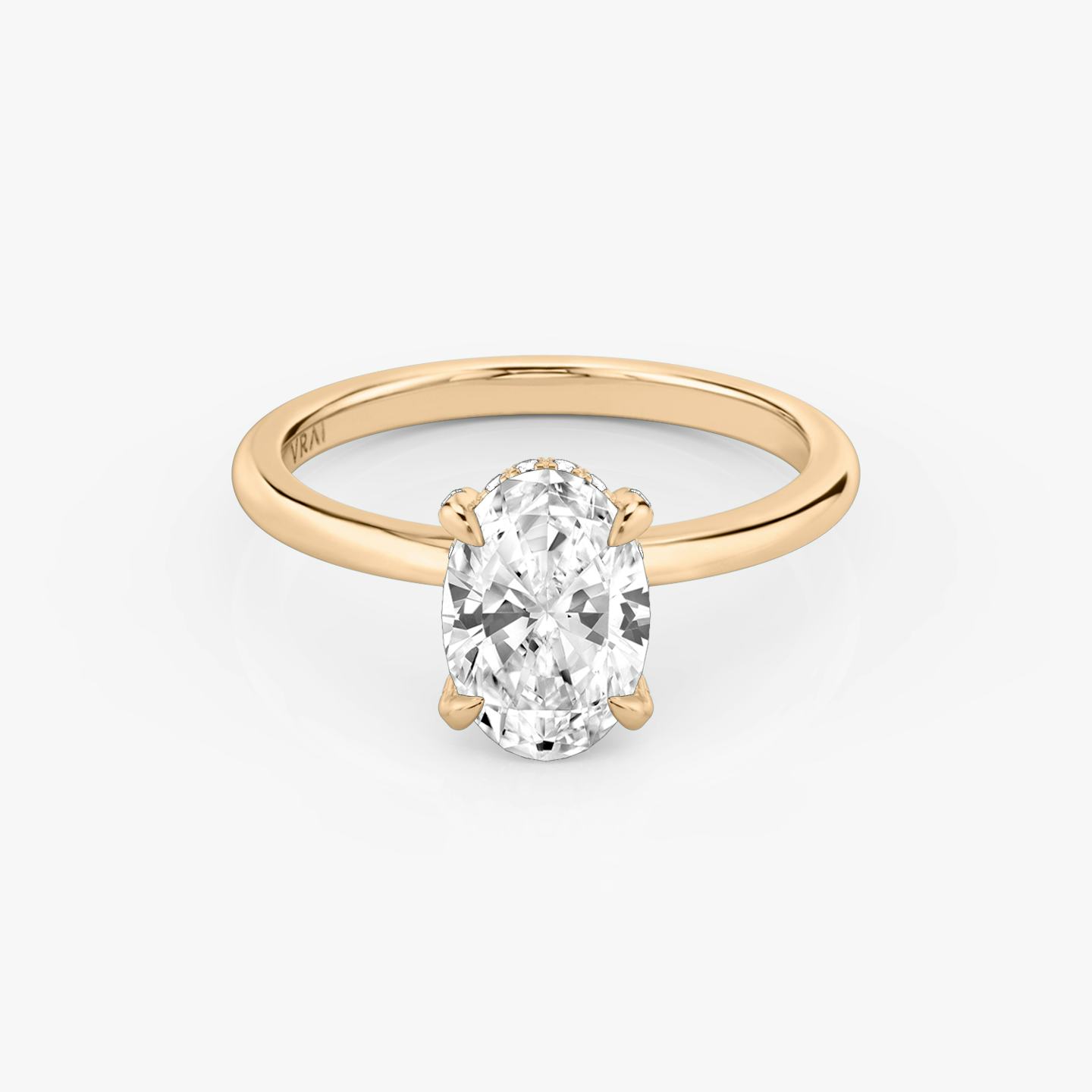 The Classic Hidden Halo | Oval | 14k | 14k Rose Gold | Band: Plain | Prong style: Pavé | Diamond orientation: vertical | Carat weight: See full inventory