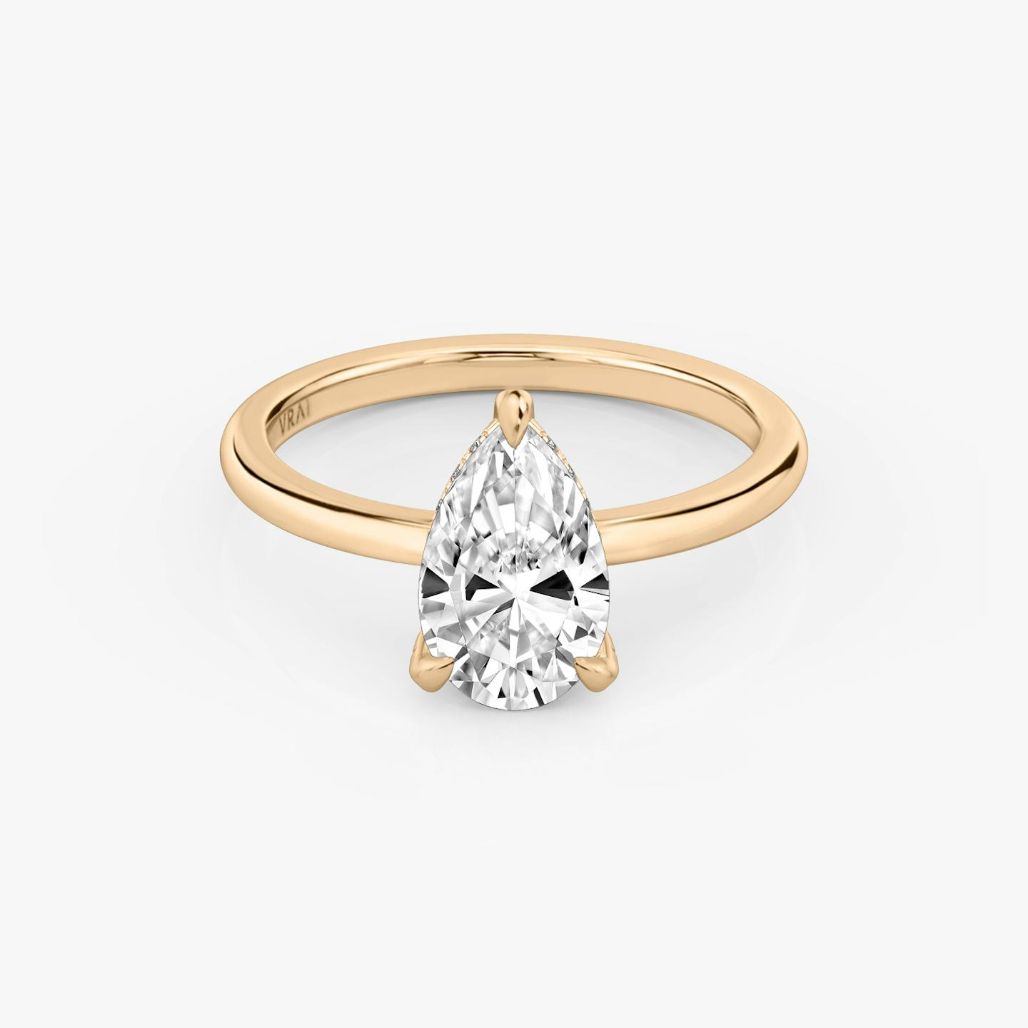 The Classic Hidden Halo | Pear | 14k | 14k Rose Gold | Band: Plain | Prong style: Pavé | Diamond orientation: vertical | Carat weight: See full inventory