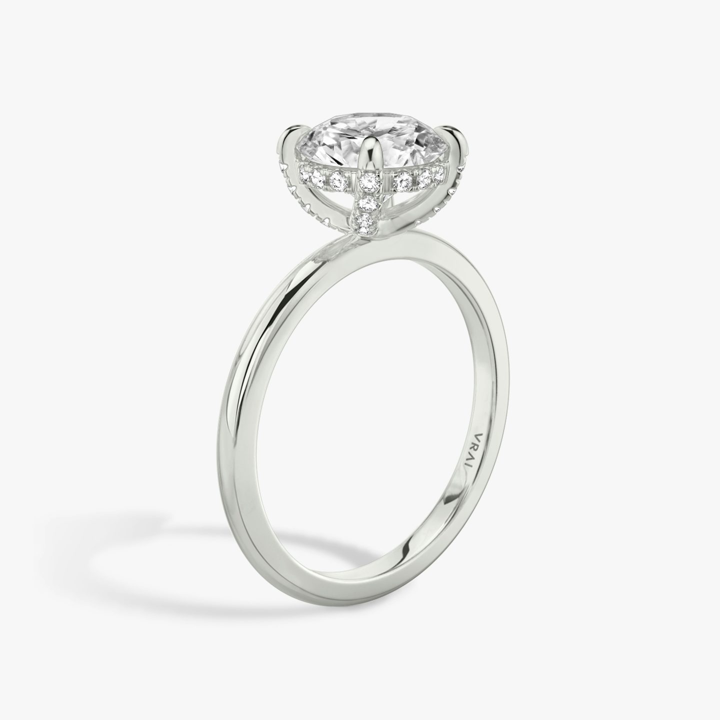 The Classic Hidden Halo | Round Brilliant | 18k | 18k White Gold | Band: Plain | Carat weight: See full inventory | Prong style: Pavé | Diamond orientation: vertical