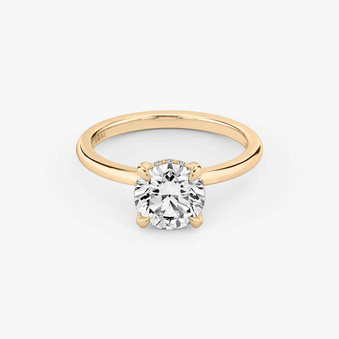 The Classic Hidden Halo | Round Brilliant | 14k | 14k Rose Gold | Band: Plain | Carat weight: See full inventory | Prong style: Pavé | Diamond orientation: vertical