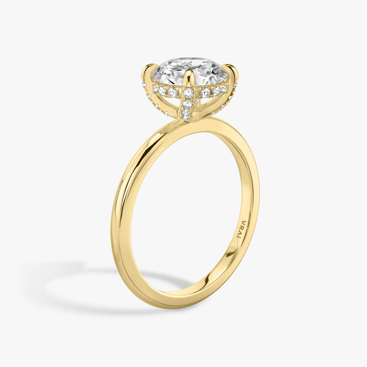 The Classic Hidden Halo | Round Brilliant | 18k | 18k Yellow Gold | Band: Plain | Carat weight: See full inventory | Prong style: Pavé | Diamond orientation: vertical