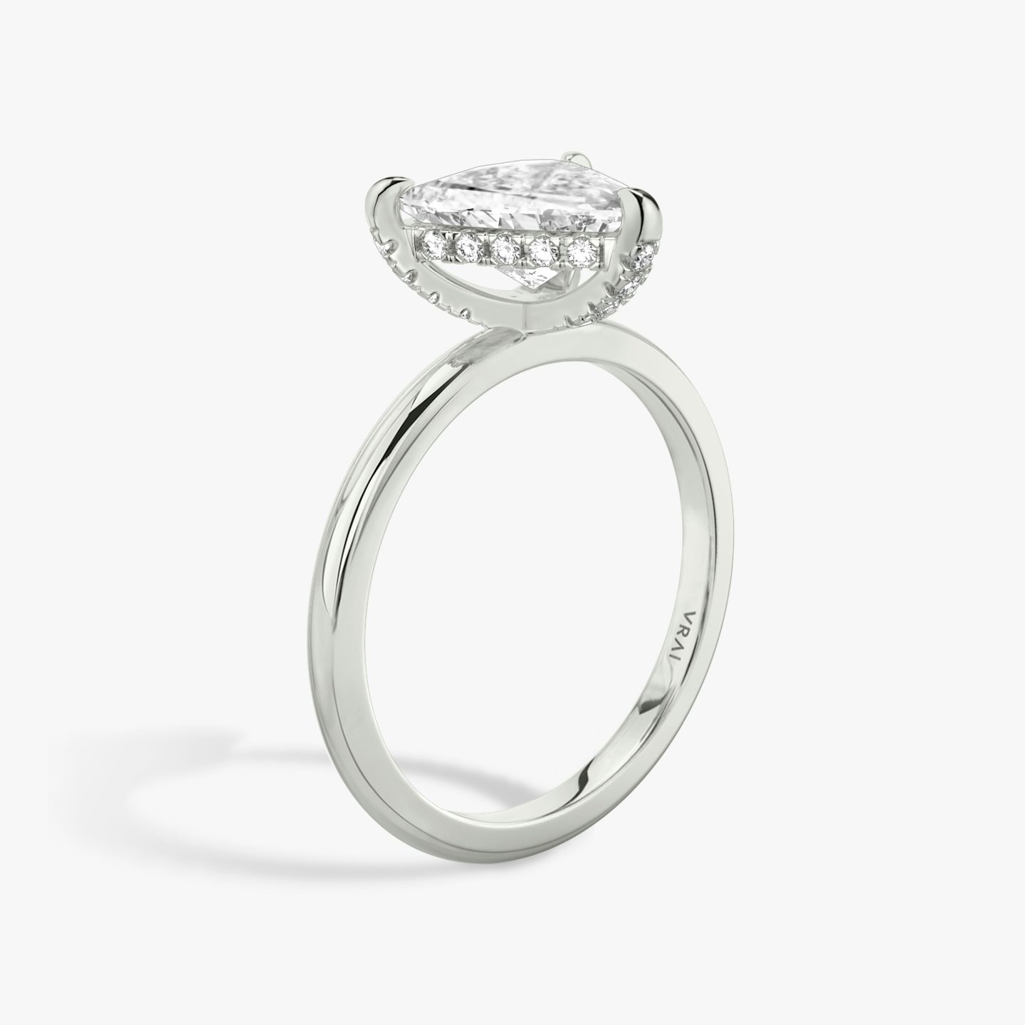 The Classic Hidden Halo | Trillion | Platinum | Band: Plain | Prong style: Pavé | Diamond orientation: vertical | Carat weight: See full inventory