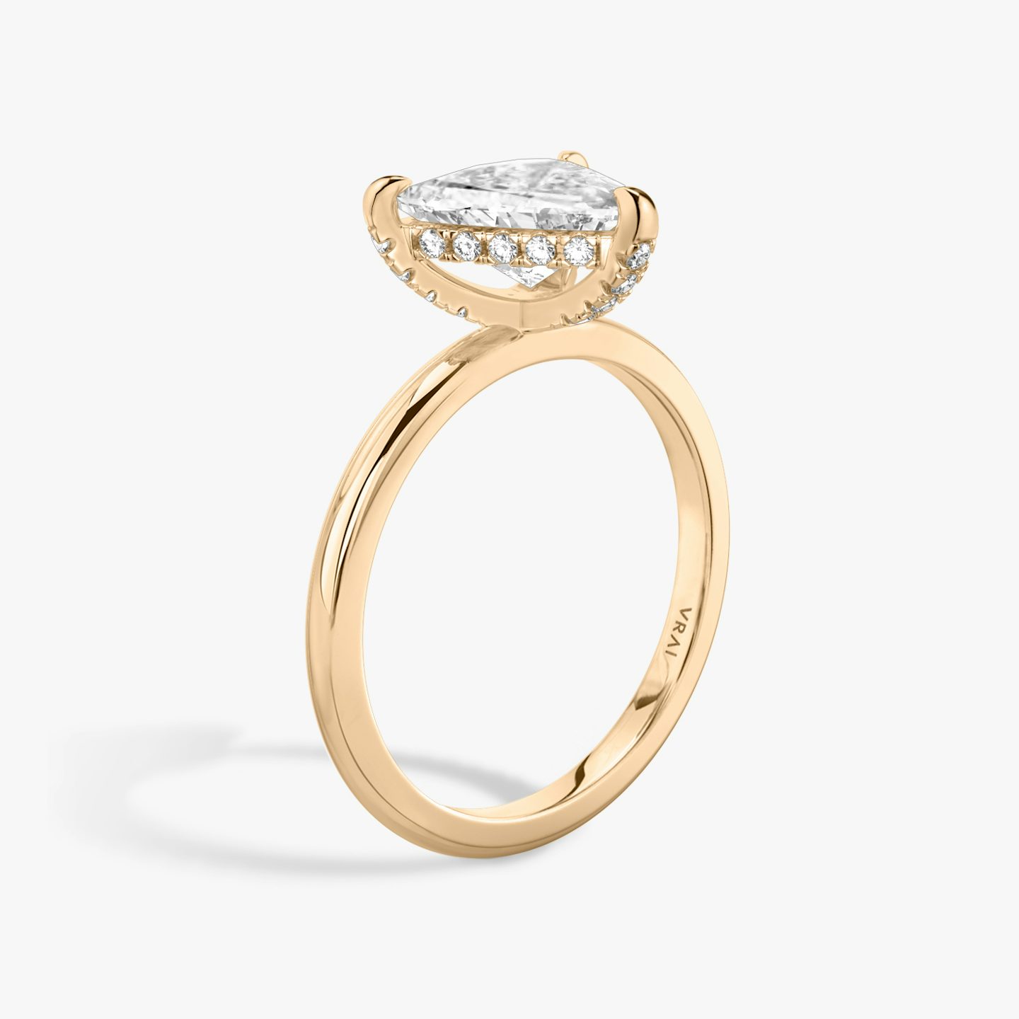 The Classic Hidden Halo | Trillion | 14k | 14k Rose Gold | Band: Plain | Prong style: Pavé | Diamond orientation: vertical | Carat weight: See full inventory