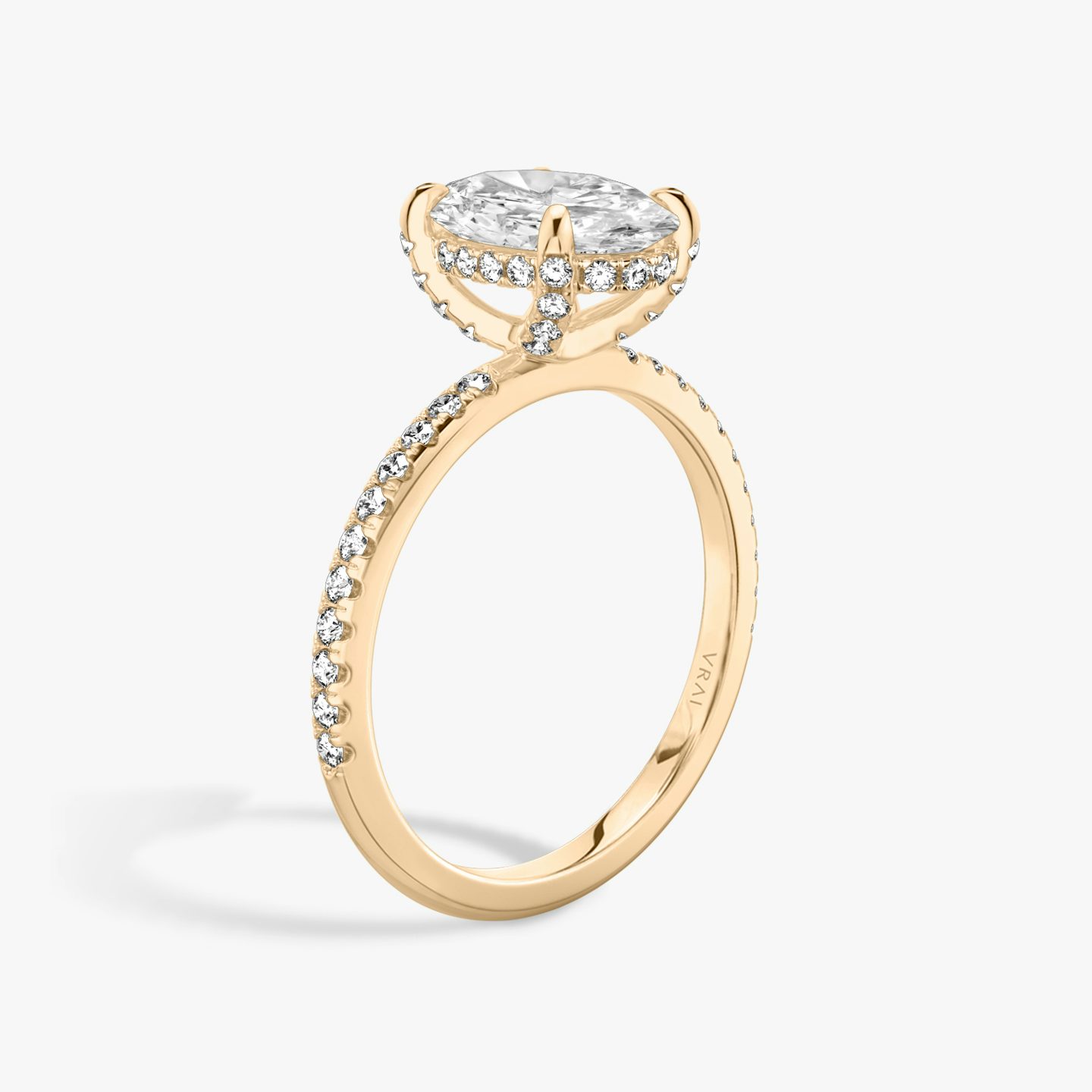 The Classic Hidden Halo | Oval | 14k | 14k Rose Gold | Band: Pavé | Prong style: Pavé | Diamond orientation: vertical | Carat weight: See full inventory
