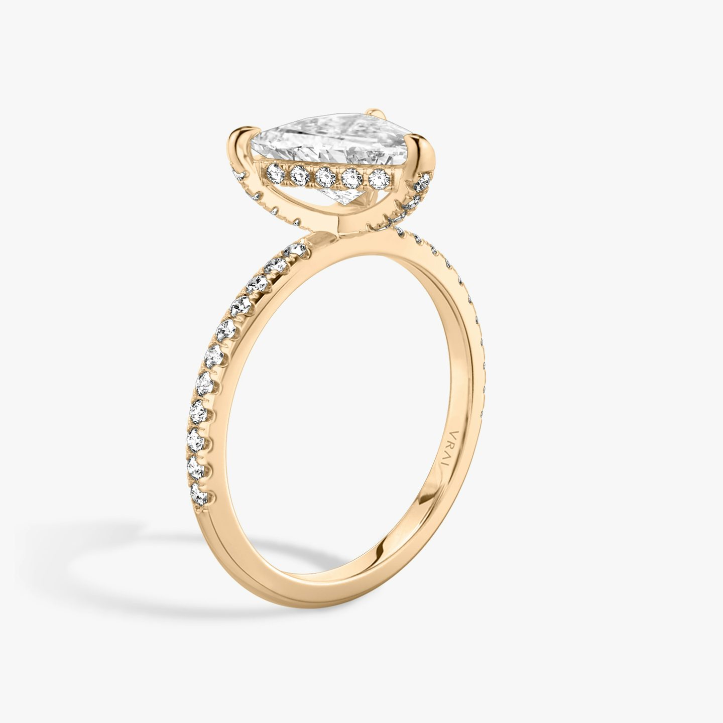 The Classic Hidden Halo | Trillion | 14k | 14k Rose Gold | Band: Pavé | Prong style: Pavé | Diamond orientation: vertical | Carat weight: See full inventory