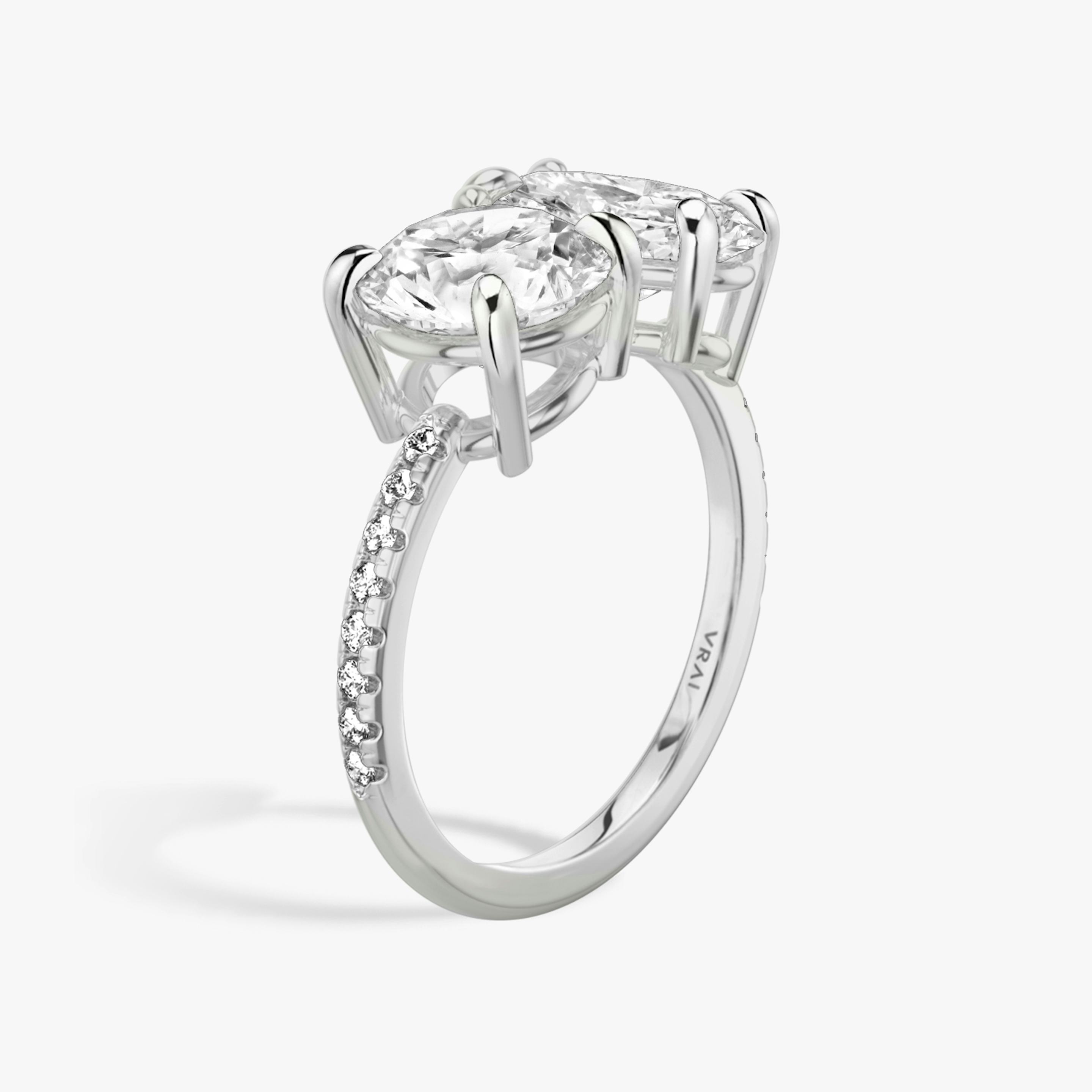 The Toi et Moi | Round Brilliant and Oval | Platinum | Band: Pavé | Diamond orientation: vertical | Carat weight: See full inventory