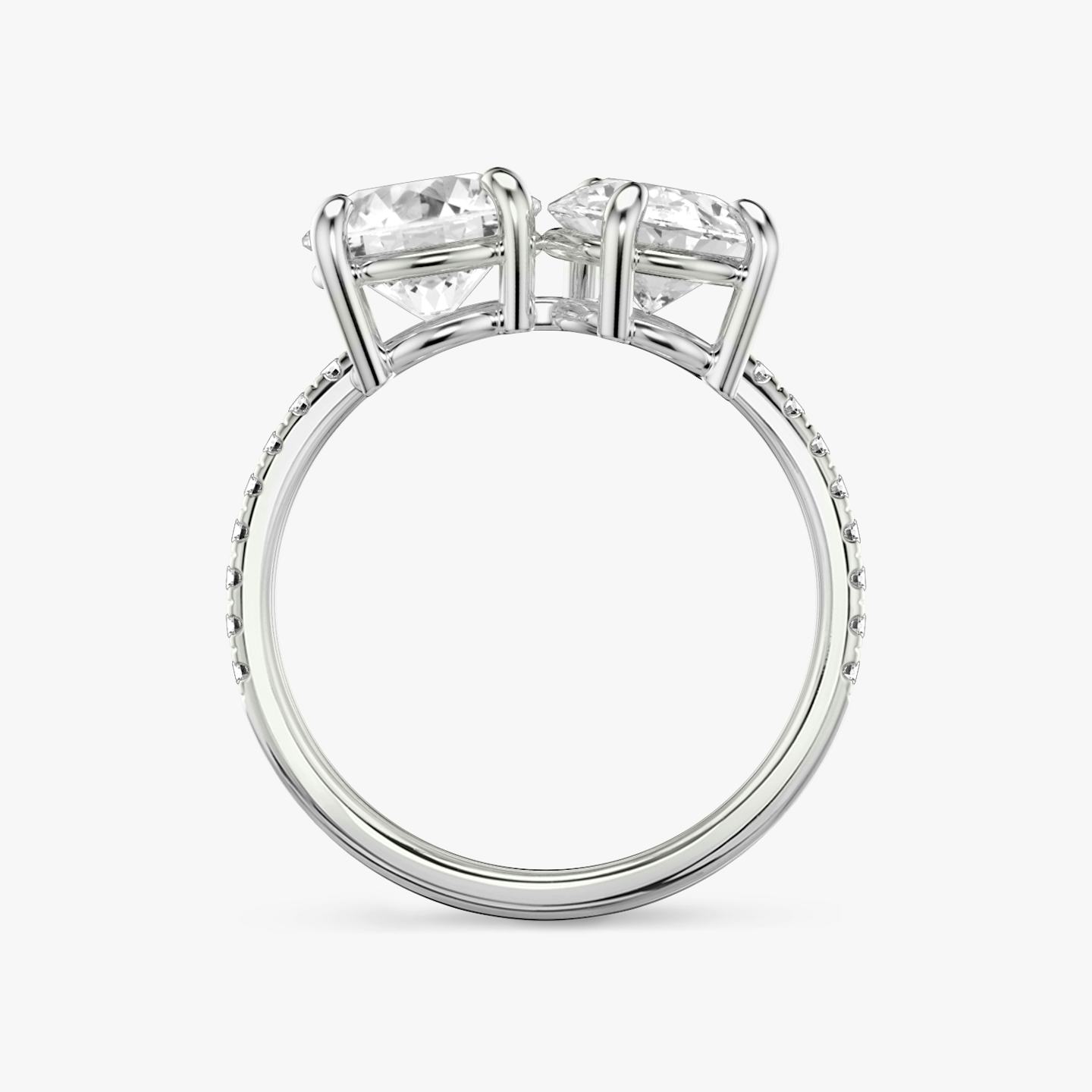 The Toi et Moi | Round Brilliant and Pear | Platinum | Band: Pavé | Diamond orientation: vertical | Carat weight: See full inventory