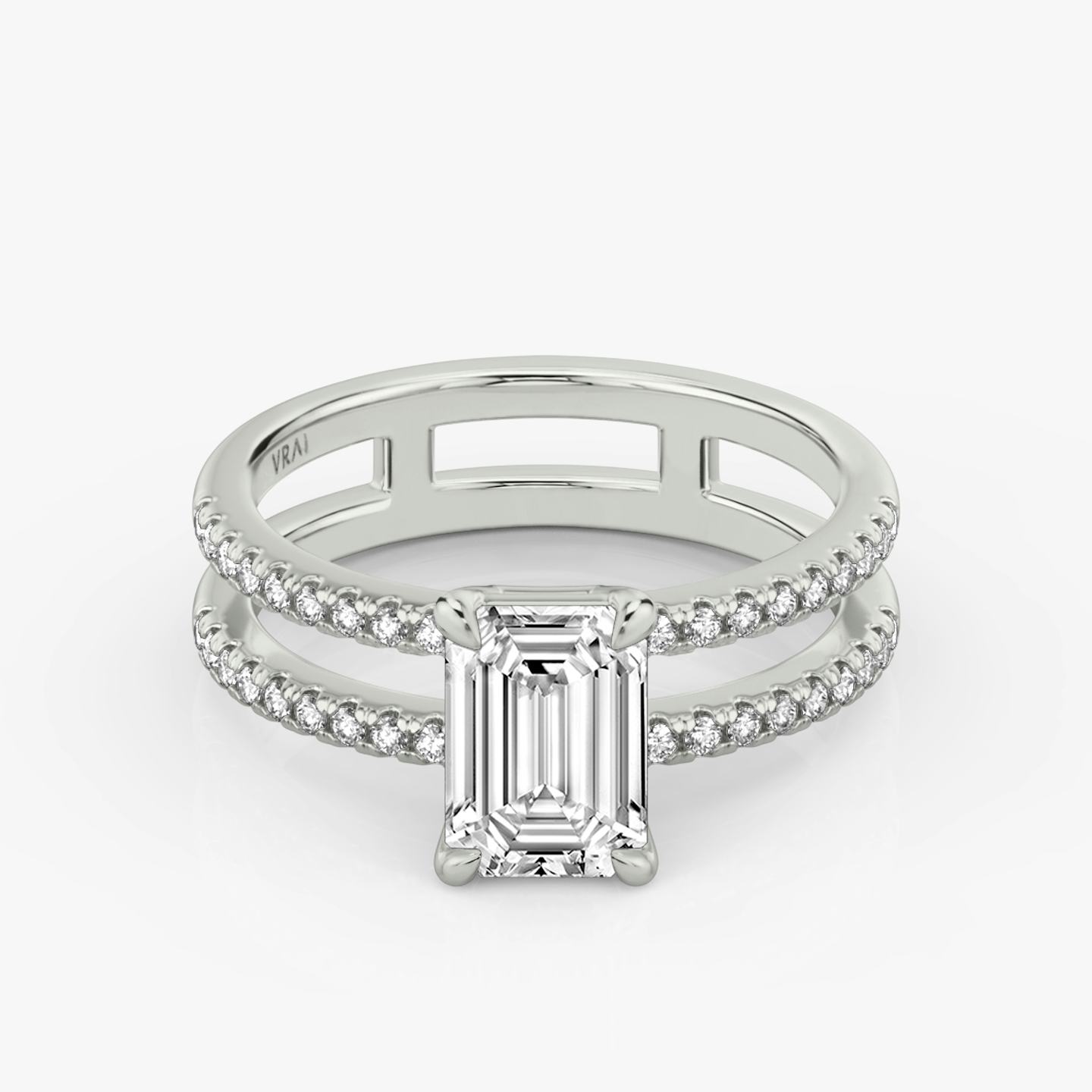 The Double Band | Emerald | Platinum | Band: Pavé | Band stone shape: Round Brilliant | Diamond orientation: vertical | Carat weight: See full inventory