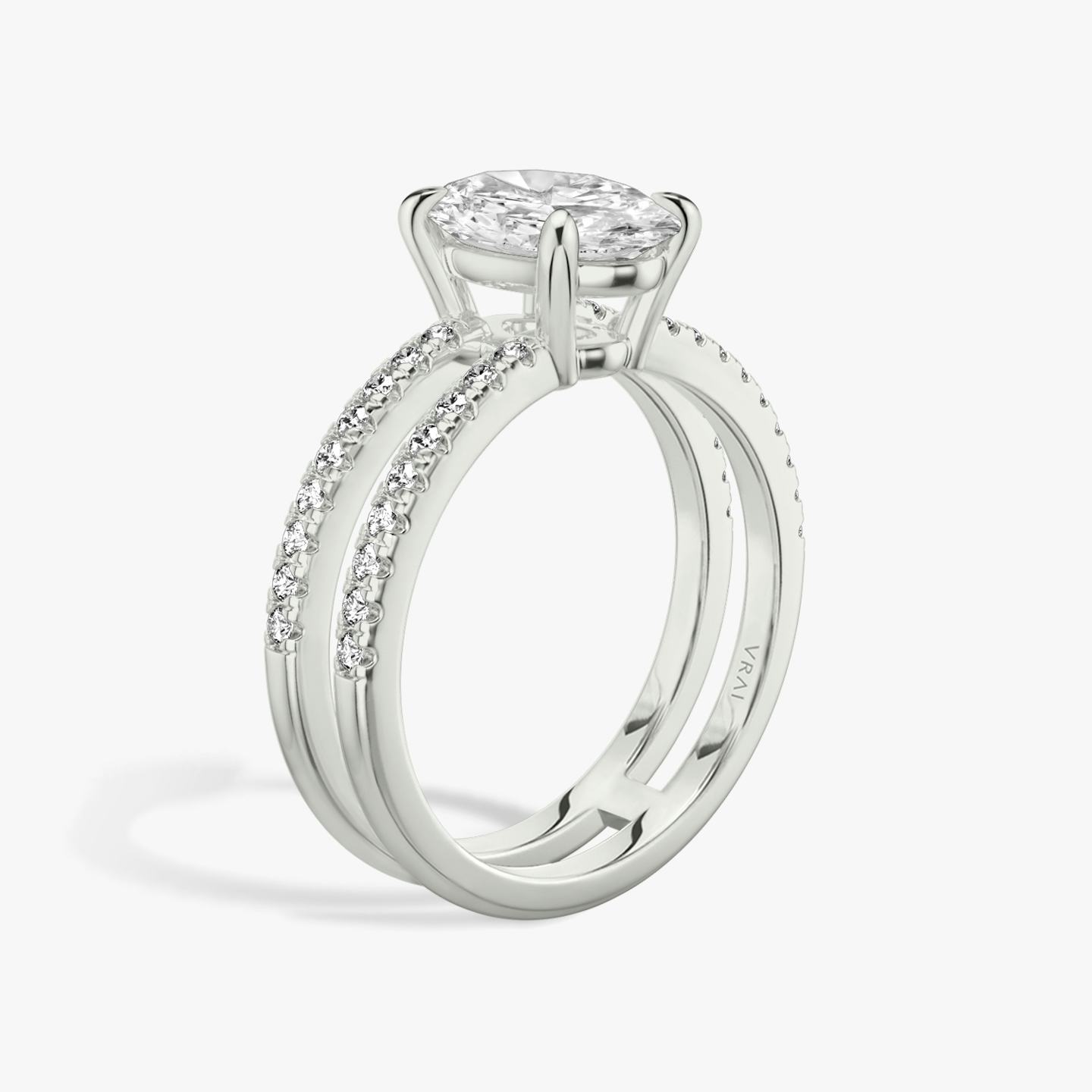 The Double Band | Oval | Platinum | Band: Pavé | Band stone shape: Round Brilliant | Diamond orientation: vertical | Carat weight: See full inventory