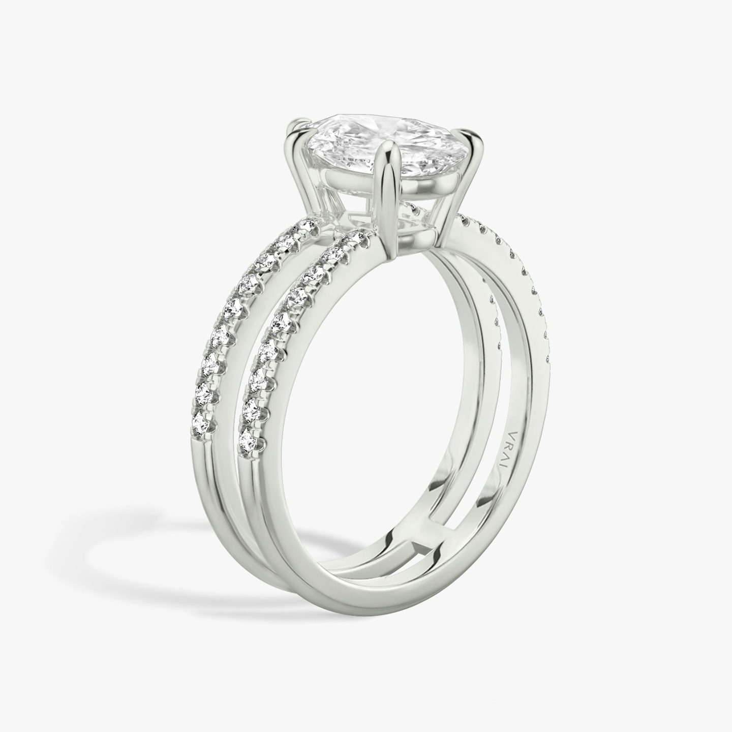 The Double Band | Pear | Platinum | Band: Pavé | Band stone shape: Round Brilliant | Diamond orientation: vertical | Carat weight: See full inventory