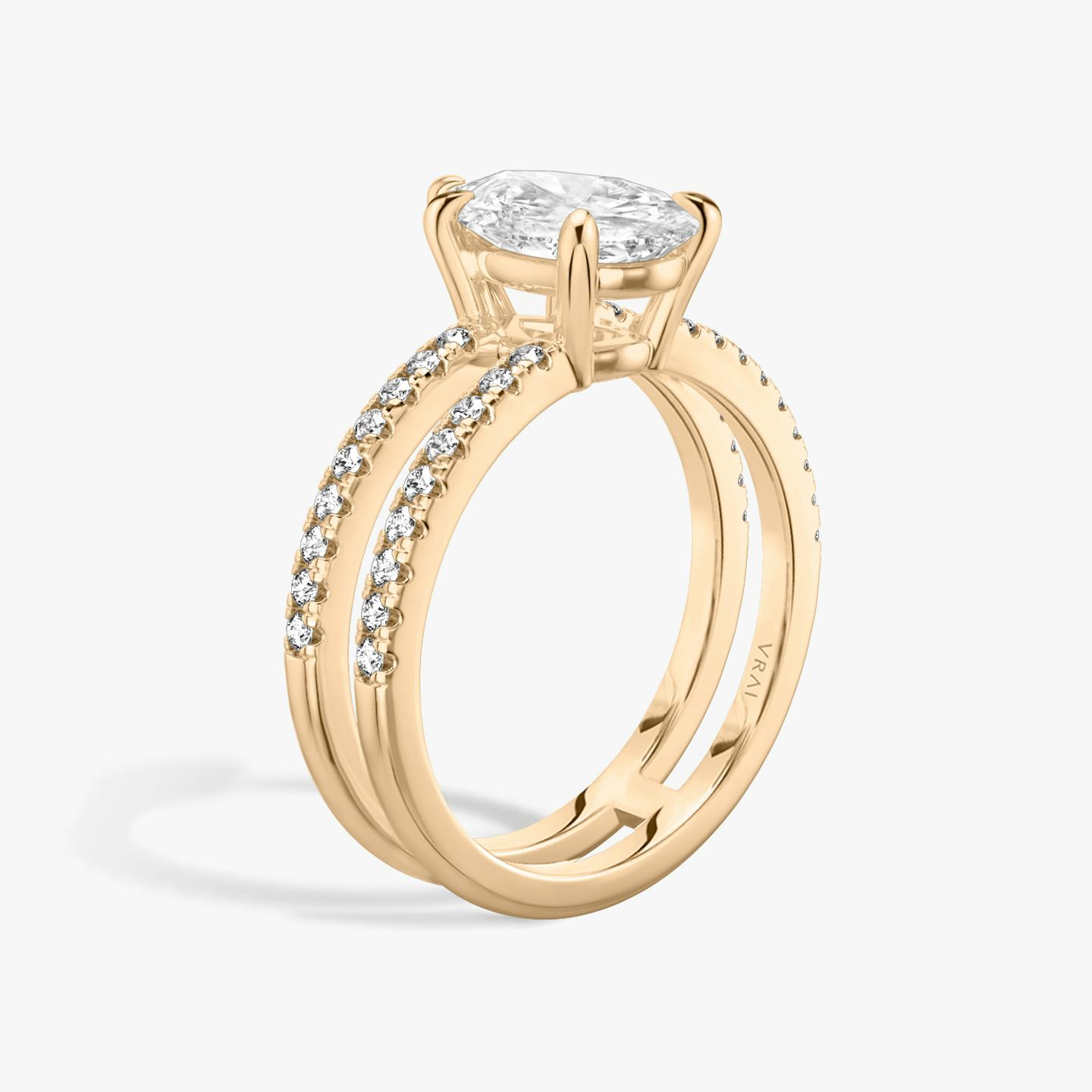 The Double Band | Pear | 14k | 14k Rose Gold | Band: Pavé | Band stone shape: Round Brilliant | Diamond orientation: vertical | Carat weight: See full inventory