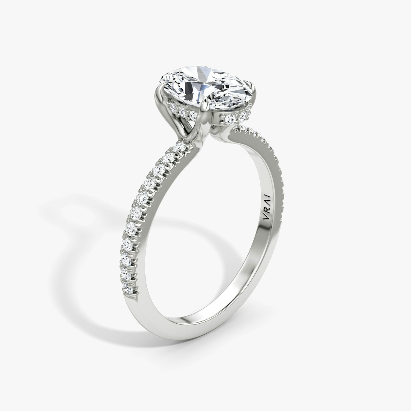 The Floating Solitaire | Oval | 18k | 18k White Gold | Band: Pavé | Diamond orientation: vertical | Carat weight: See full inventory