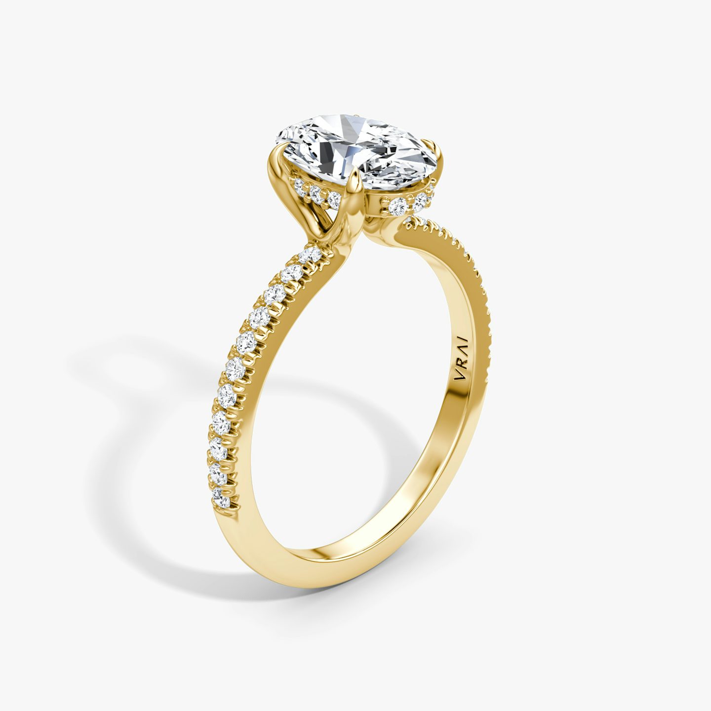 Floating Solitaire | oval | 18k | yellow-gold | bandAccent: pave | diamondOrientation: vertical | caratWeight: other