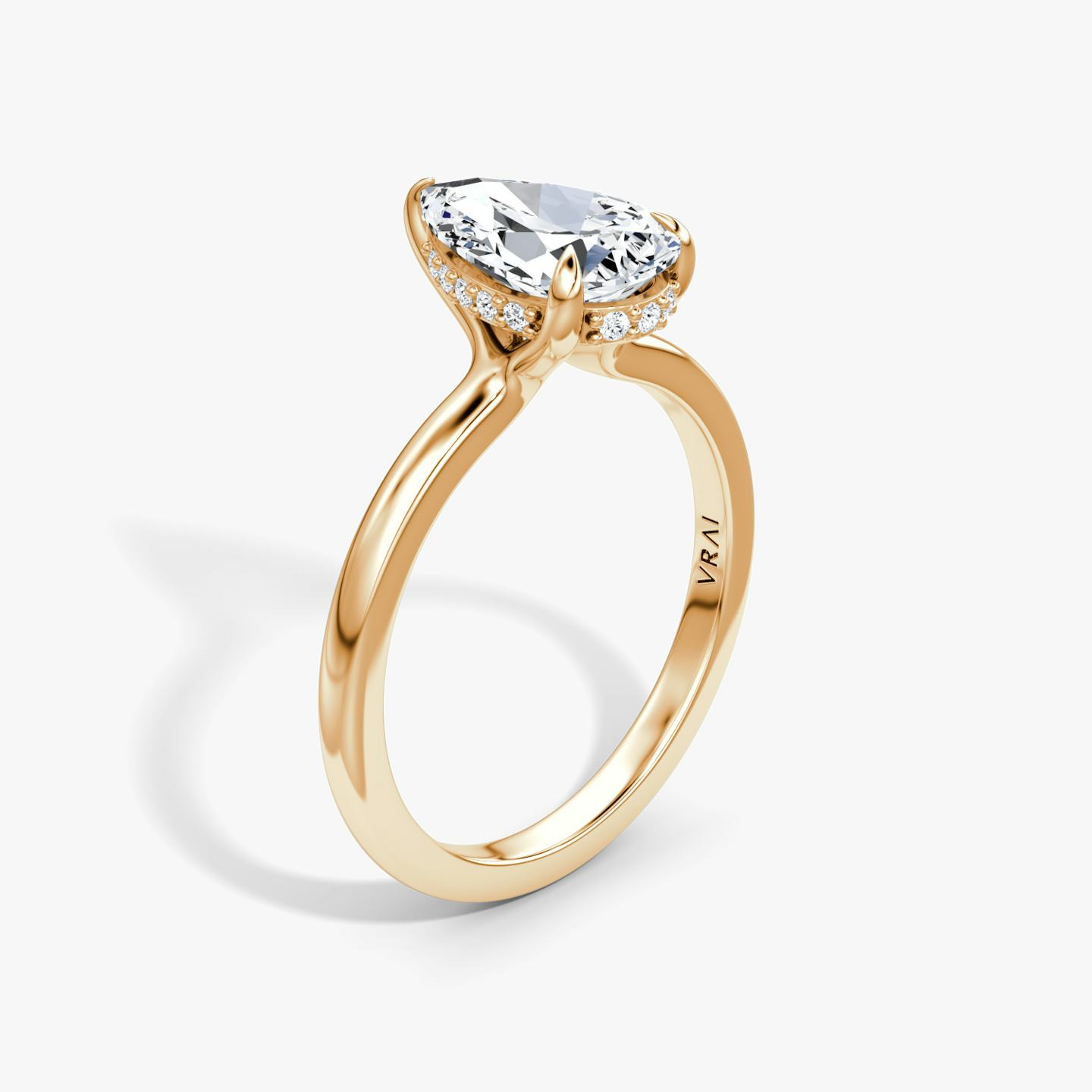 The Floating Solitaire | Pear | 14k | 14k Rose Gold | Band: Plain | Diamond orientation: vertical | Carat weight: See full inventory