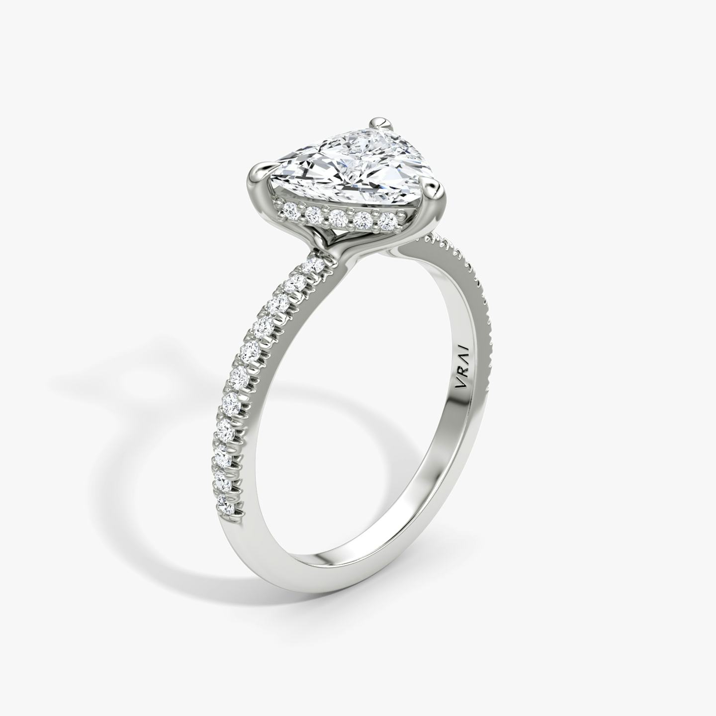The Floating Solitaire | Trillion | Platinum | Band: Pavé | Diamond orientation: vertical | Carat weight: See full inventory