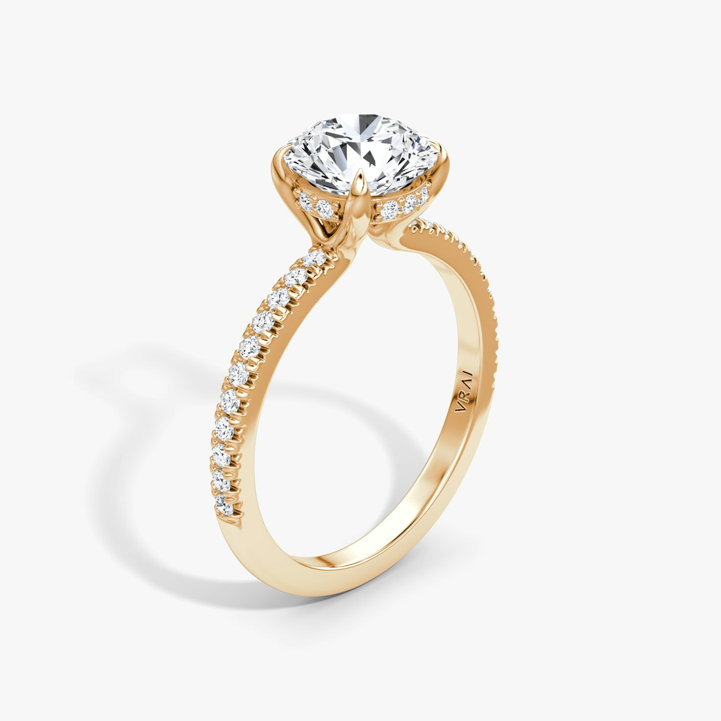 The Floating Solitaire | Round Brilliant | 14k | 14k Rose Gold | Band: Pavé | Carat weight: See full inventory | Diamond orientation: vertical