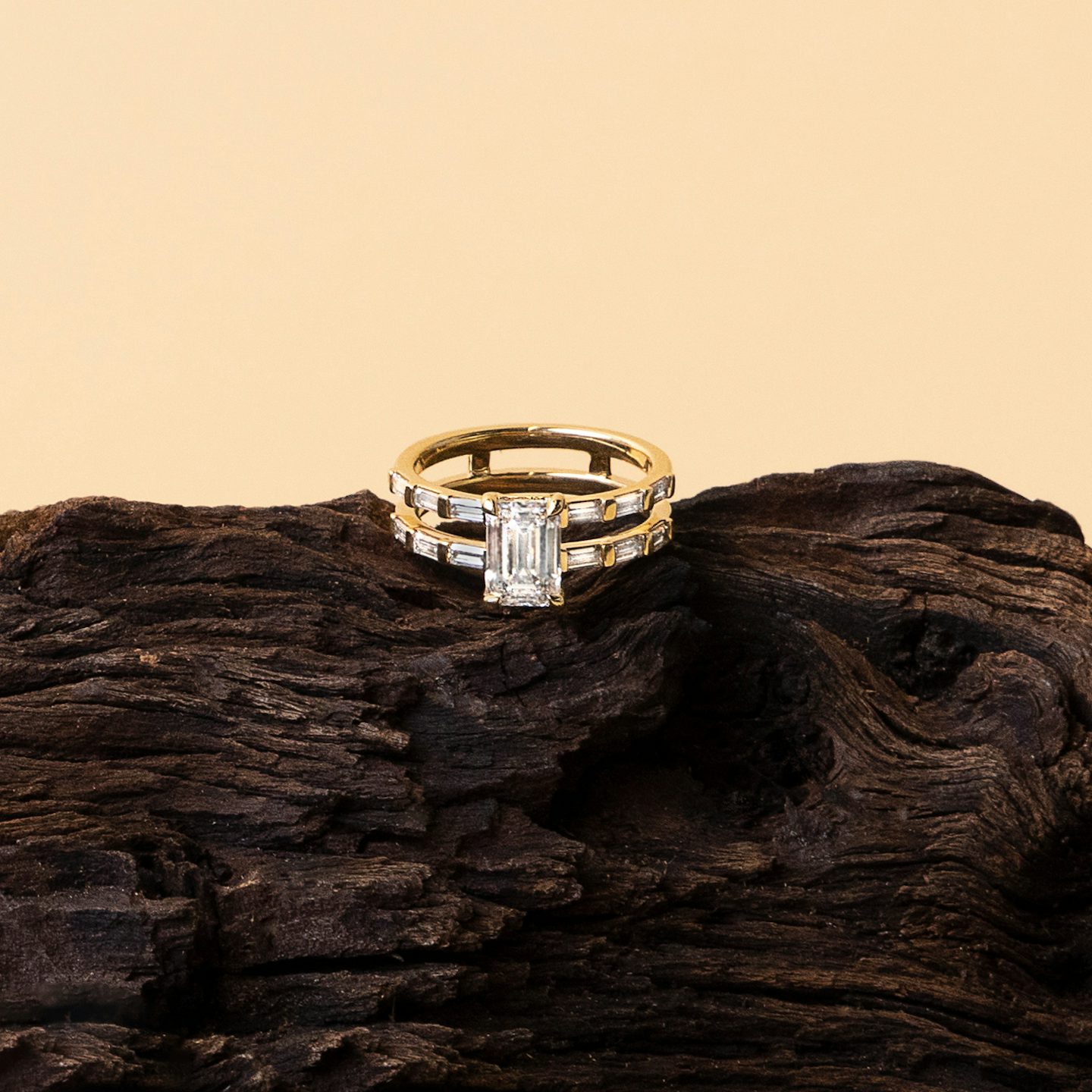 The Double Band | Emerald | Platinum | Band: Pavé | Band stone shape: Round Brilliant | Diamond orientation: vertical | Carat weight: See full inventory
