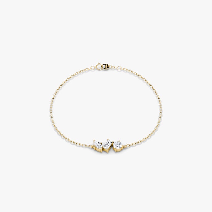 Orion ArmbandRund, Baguette und Marquise | Yellow Gold