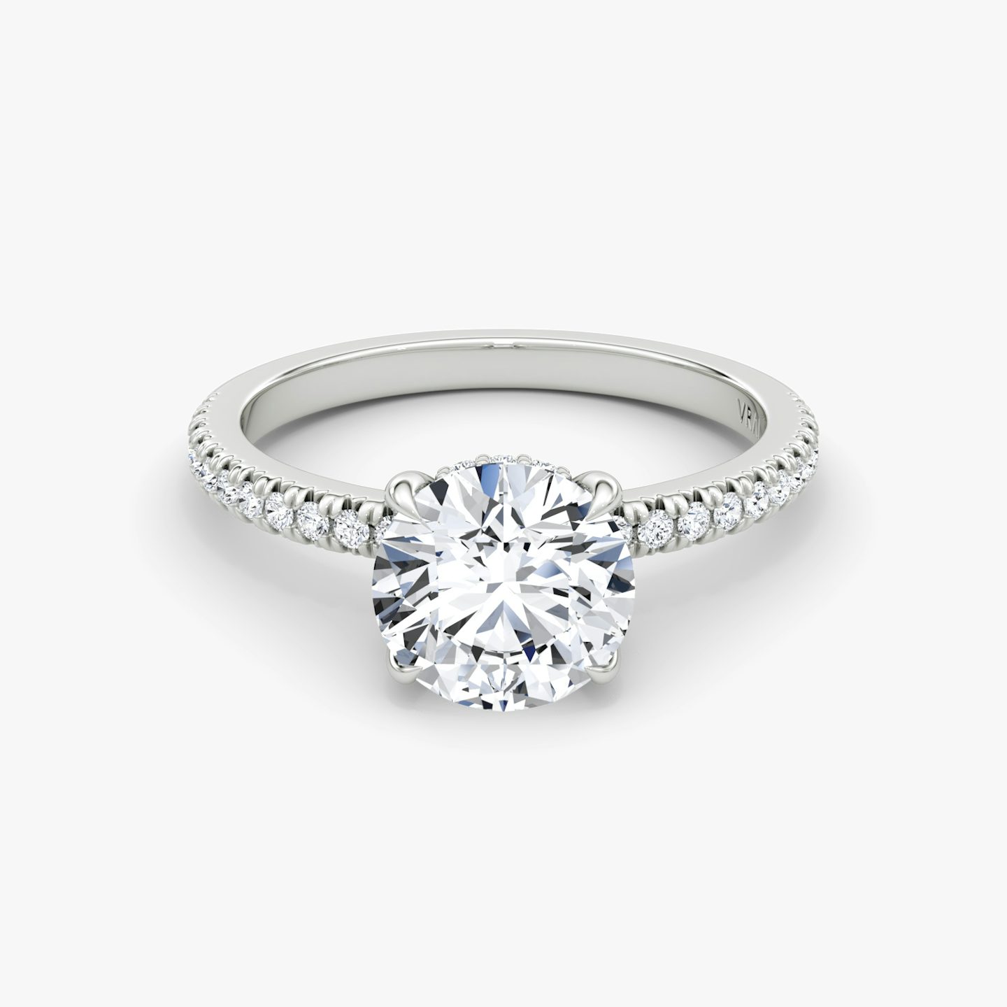 The Floating Solitaire | Round Brilliant | Platinum | Band: Pavé | Carat weight: See full inventory | Diamond orientation: vertical