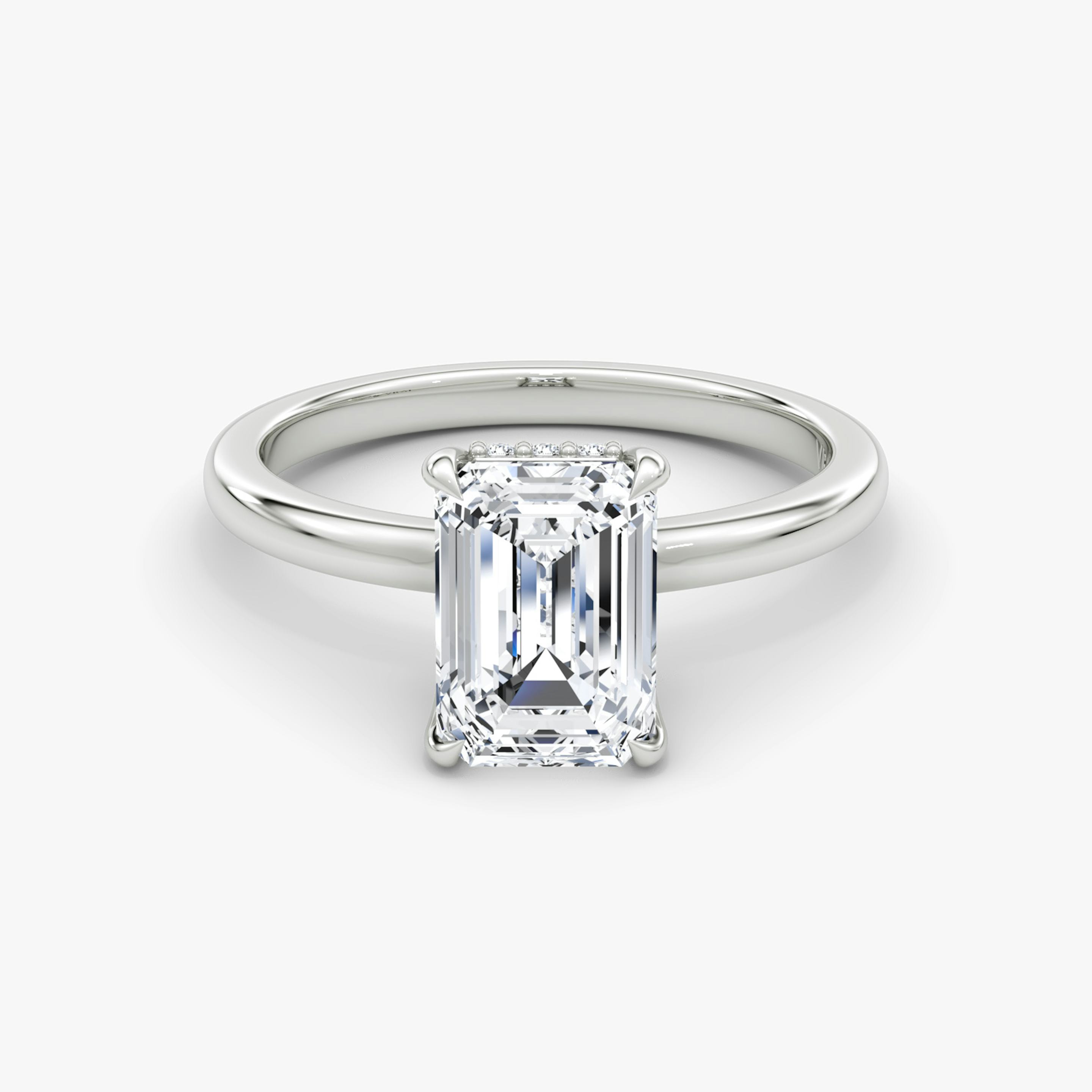 The Floating Solitaire | Emerald | Platinum | Band: Plain | Diamond orientation: vertical | Carat weight: See full inventory