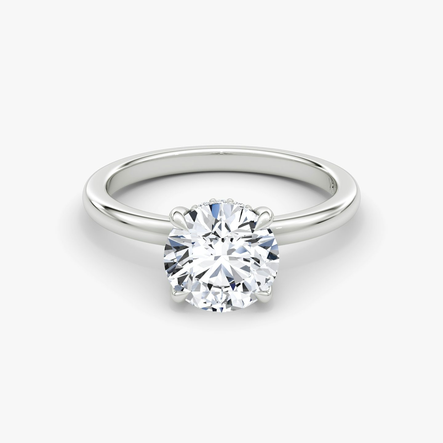 The Floating Solitaire | Round Brilliant | Platinum | Band: Plain | Carat weight: See full inventory | Diamond orientation: vertical