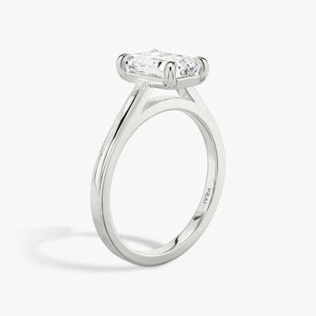 White Gold Cathedral engagement ring with Emerald cut diamond