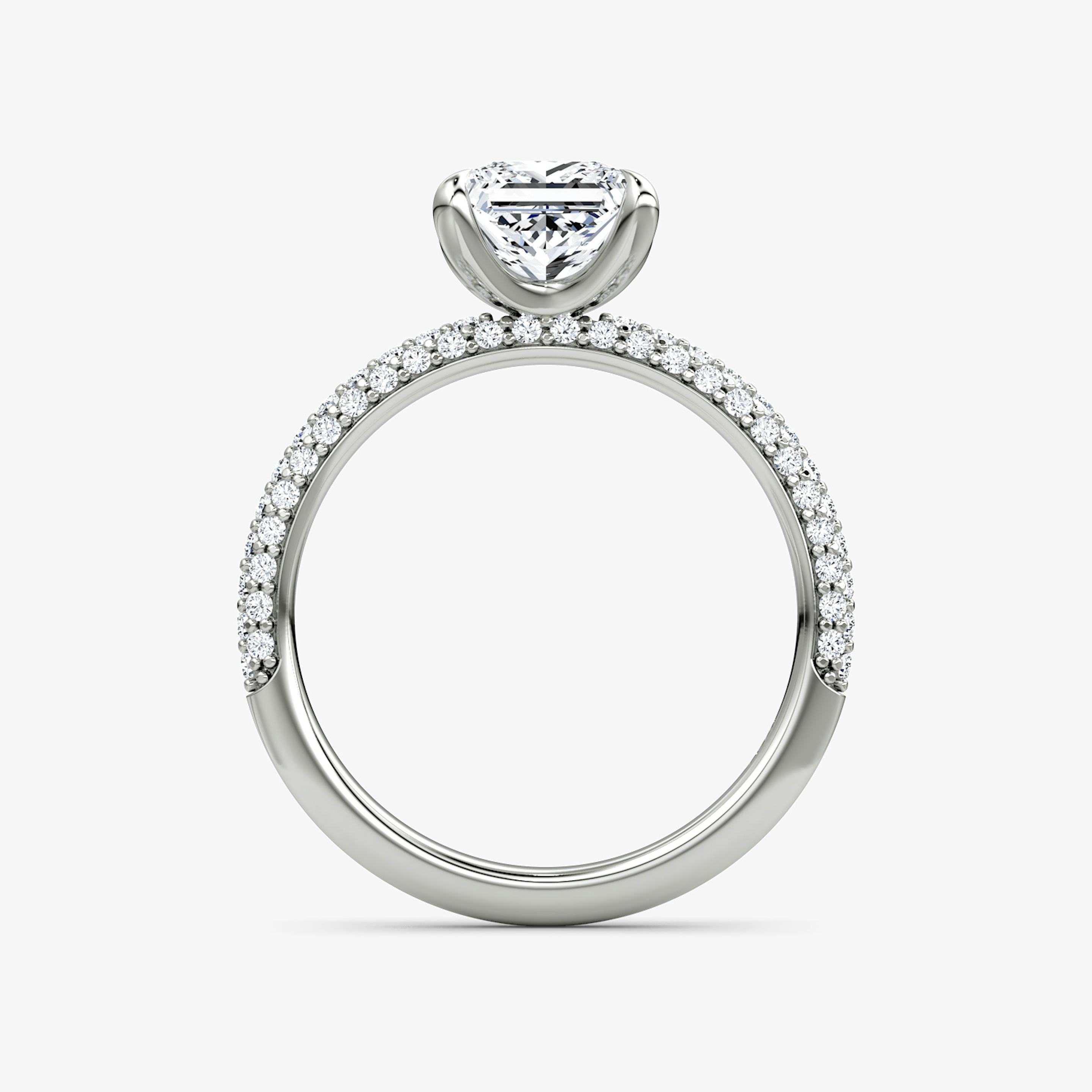 profile view of three-row dome engagement ring princess cut in pave white gold