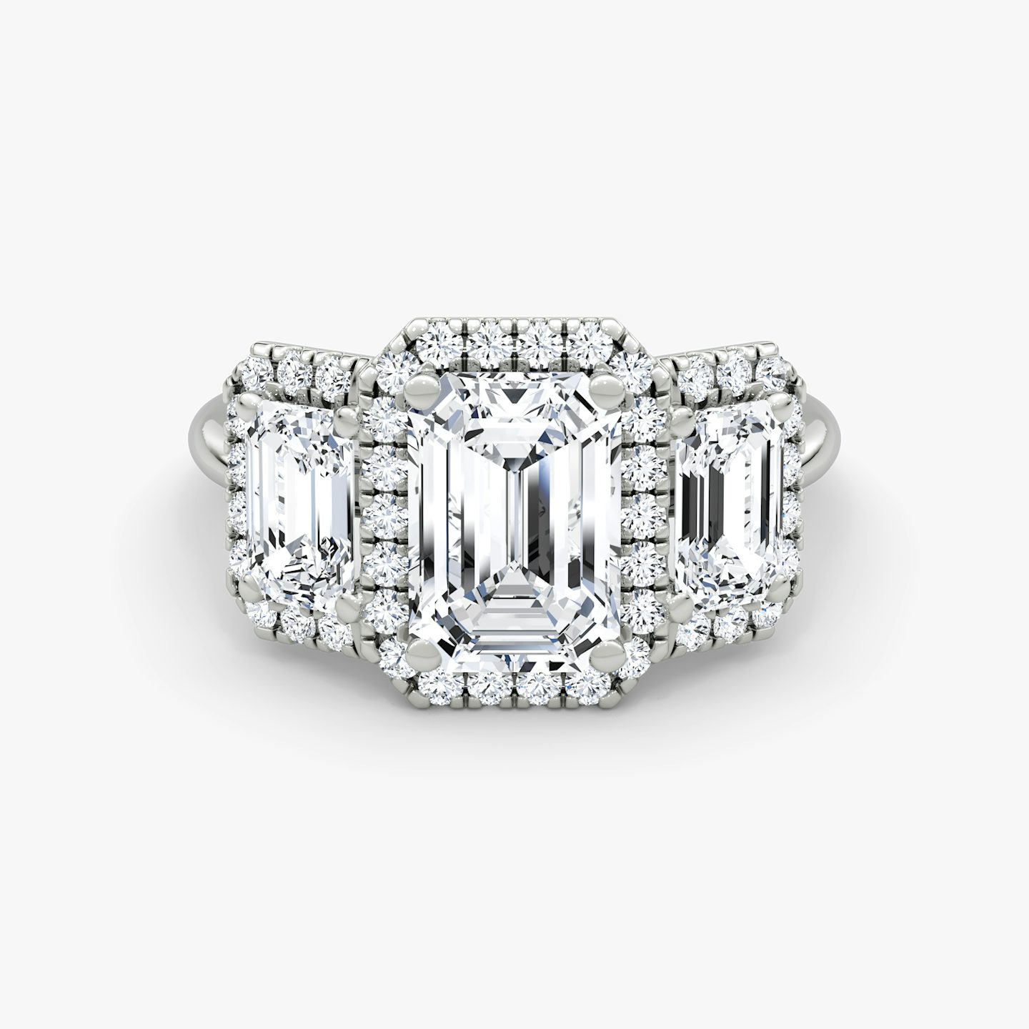 Bague de fiançailles Three Stone Halo | emerald | 18k | white-gold | sideStoneCarat: 0.50ct | diamondOrientation: vertical | caratWeight: other