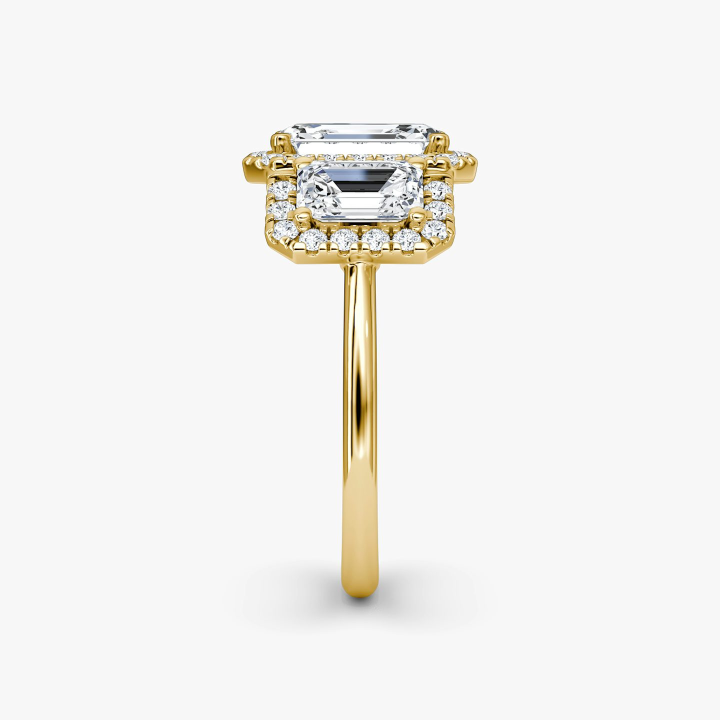 The Three Stone Halo | Emerald | 18k | 18k Yellow Gold | Band: Plain | Side stone carat: 1/2 | Diamond orientation: vertical | Carat weight: See full inventory