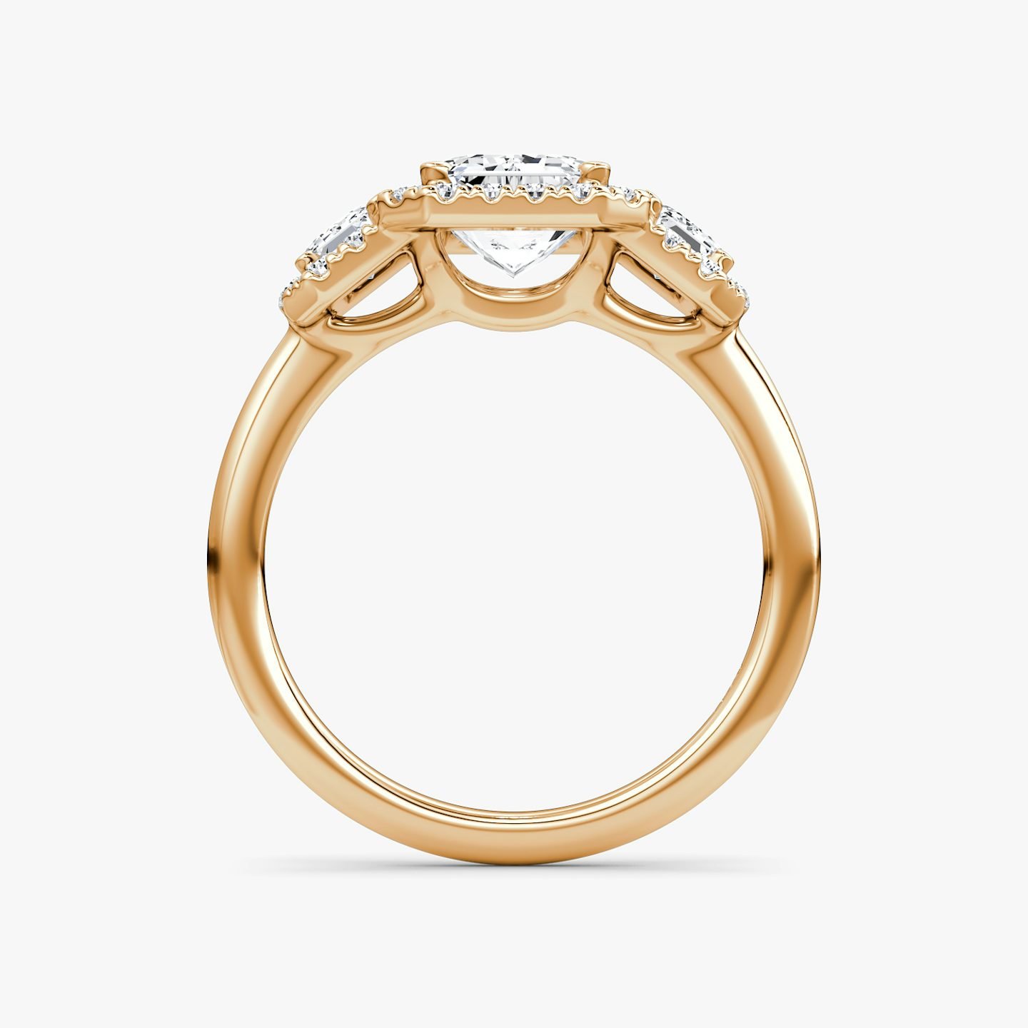 The Three Stone Halo | Emerald | 14k | 14k Rose Gold | Band: Plain | Side stone carat: 1/4 | Diamond orientation: vertical | Carat weight: See full inventory