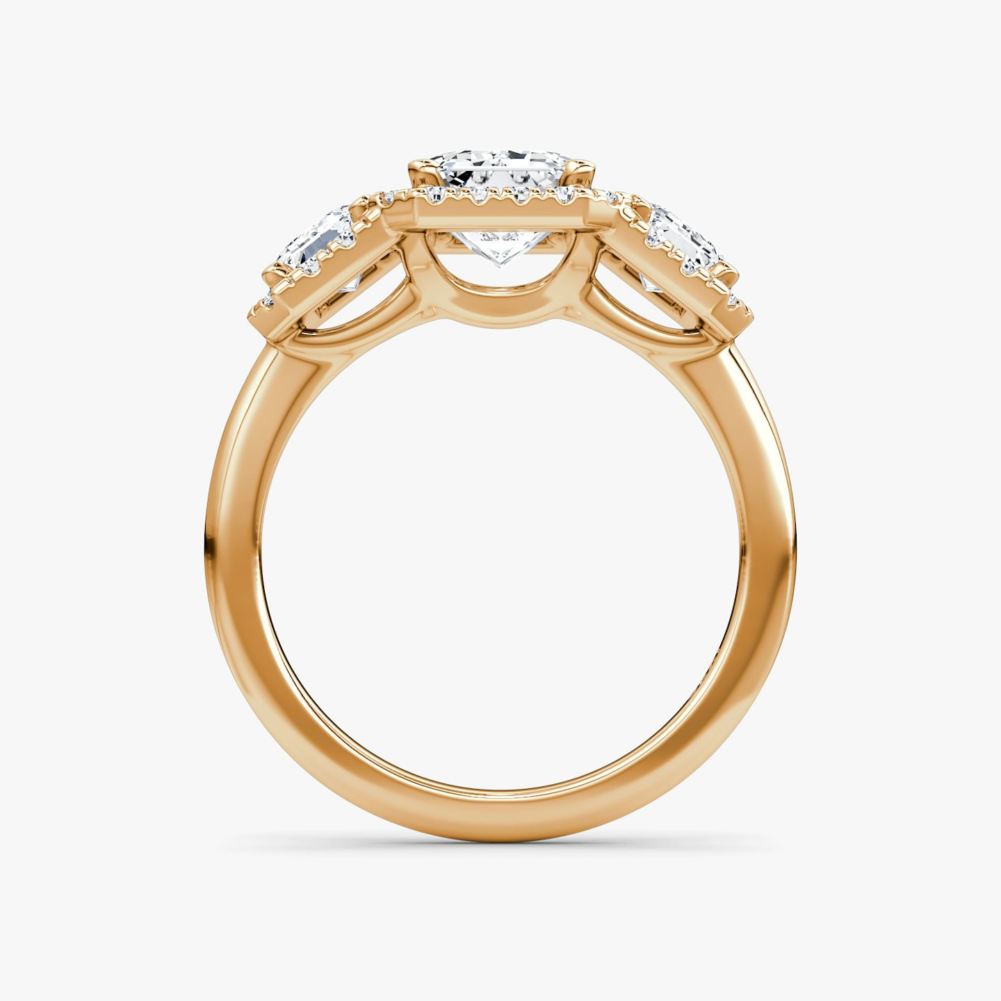 The Three Stone Halo | Emerald | 14k | 14k Rose Gold | Band: Plain | Side stone carat: 1/2 | Diamond orientation: vertical | Carat weight: See full inventory