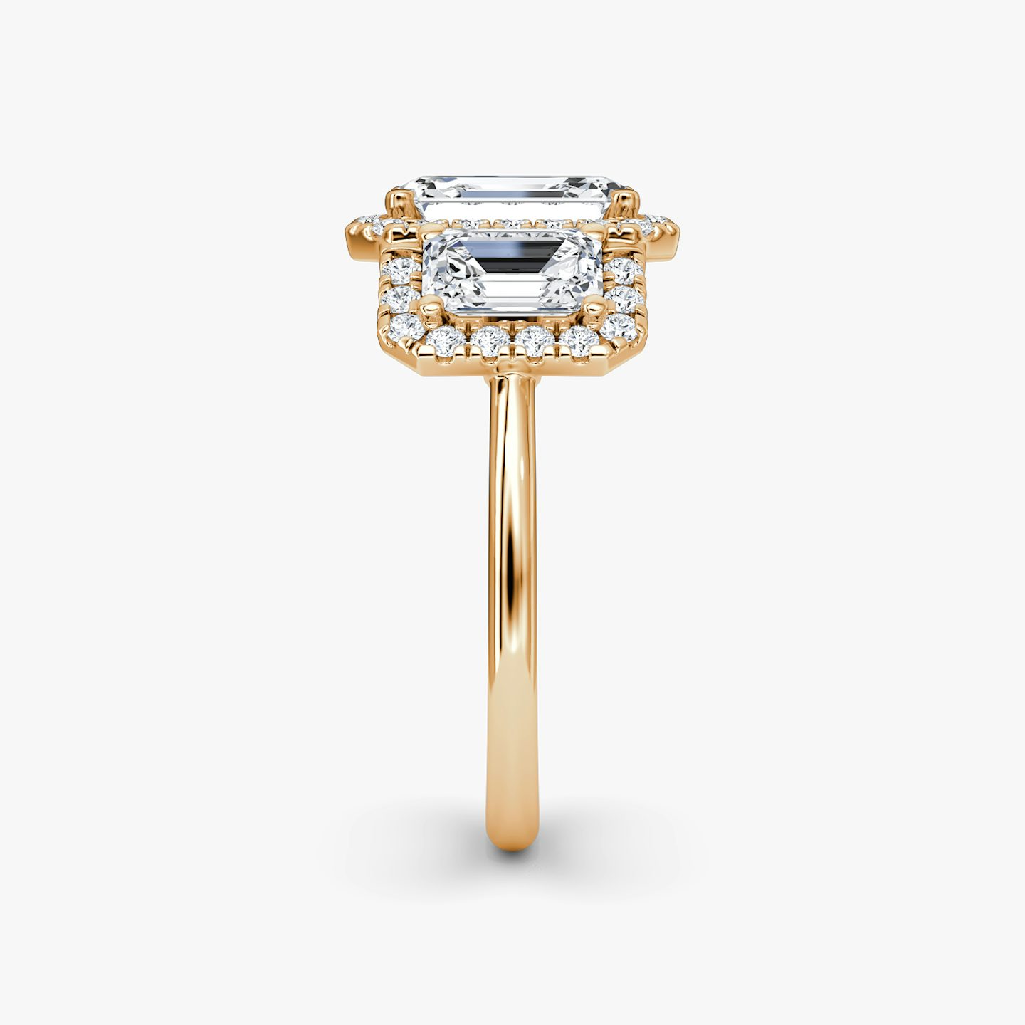 The Three Stone Halo | Emerald | 14k | 14k Rose Gold | Band: Plain | Side stone carat: 1/2 | Diamond orientation: vertical | Carat weight: See full inventory