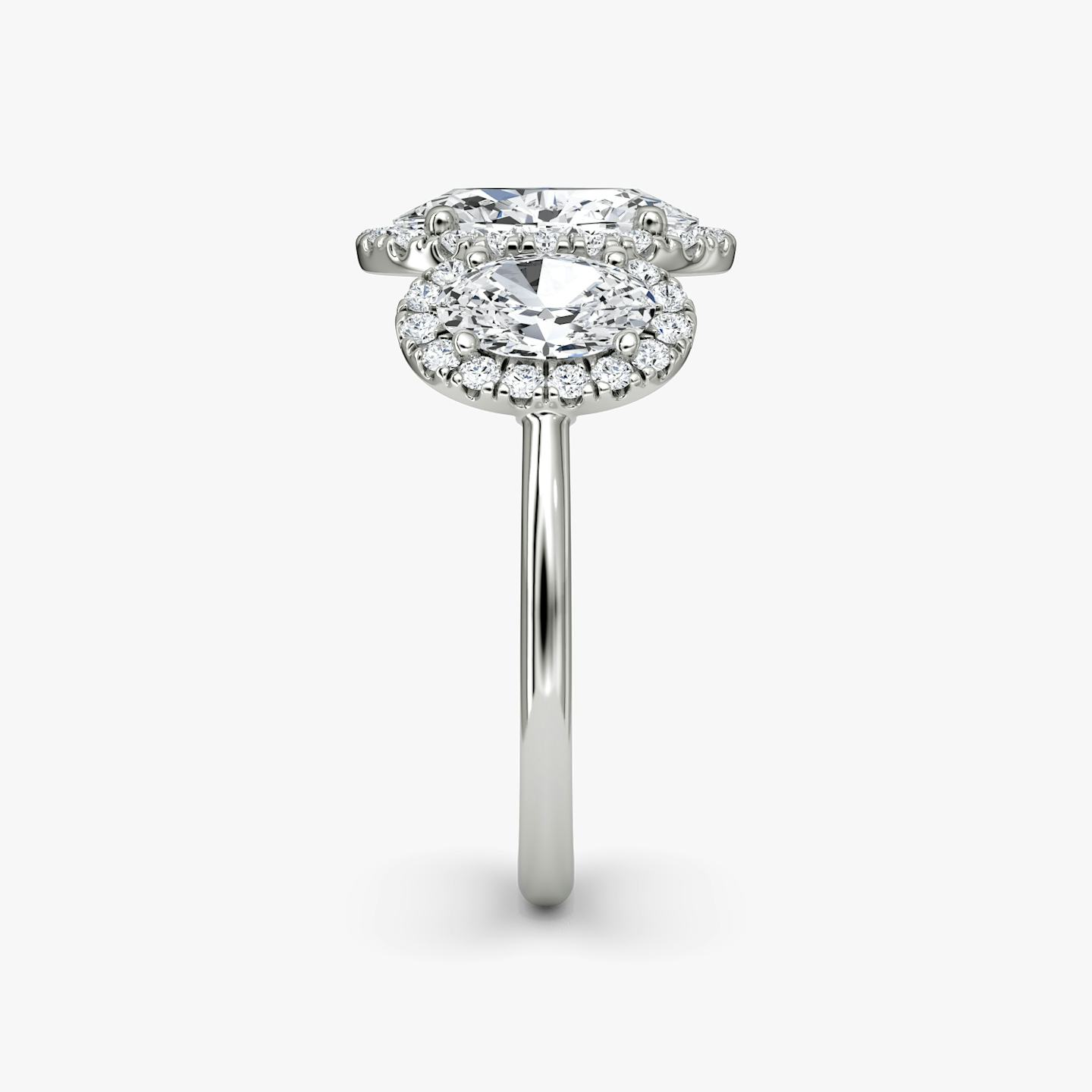 The Three Stone Halo | Oval | 18k | 18k White Gold | Side stone carat: 1/2 | Diamond orientation: vertical | Carat weight: See full inventory