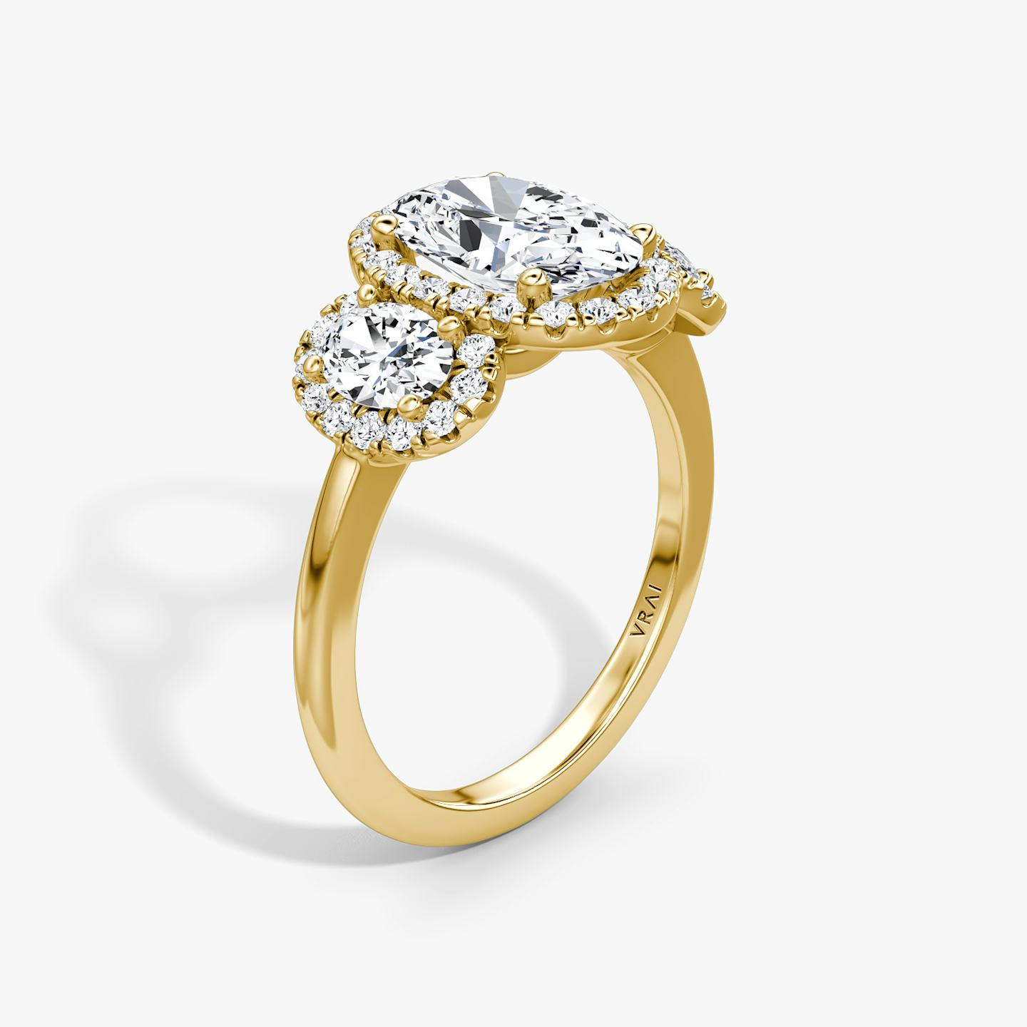 The Three Stone Halo | Oval | 18k | 18k Yellow Gold | Side stone carat: 1/4 | Diamond orientation: vertical | Carat weight: See full inventory