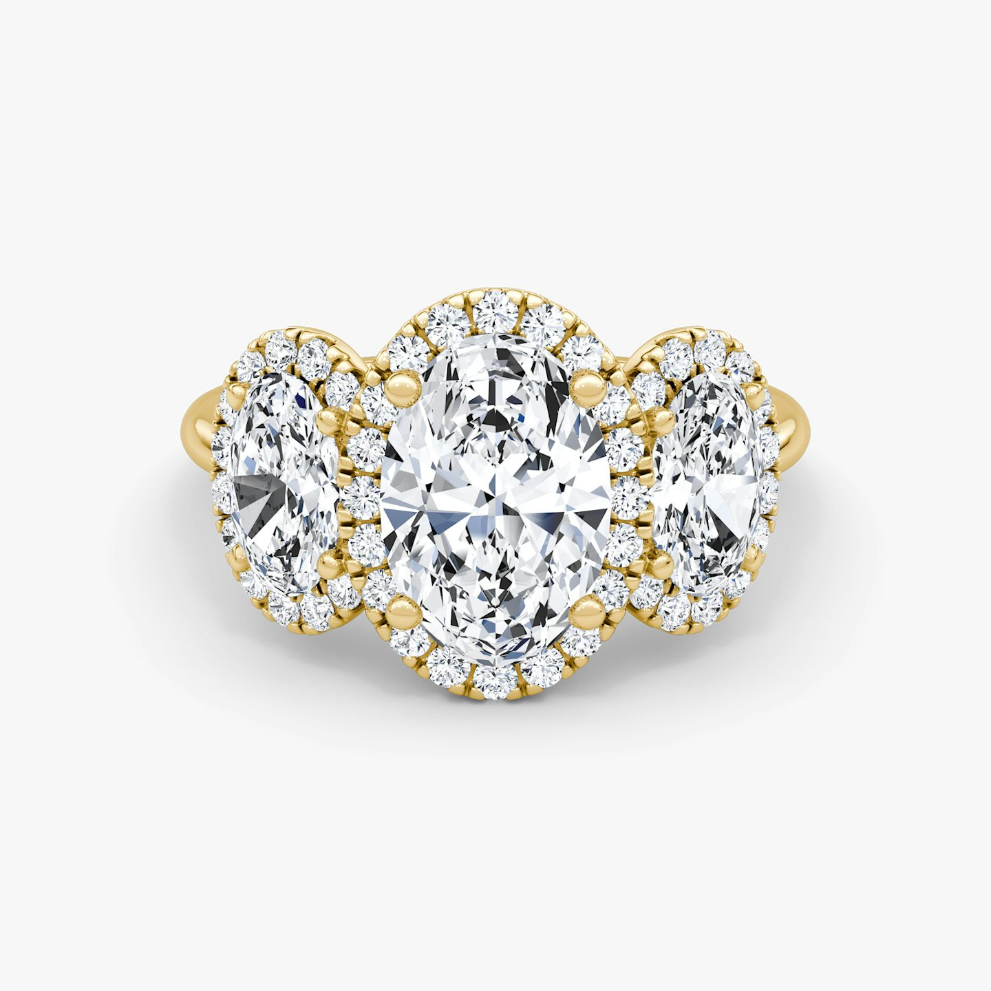 The Three Stone Halo | Oval | 18k | 18k Yellow Gold | Band: Plain | Side stone carat: 1/2 | Diamond orientation: vertical | Carat weight: See full inventory