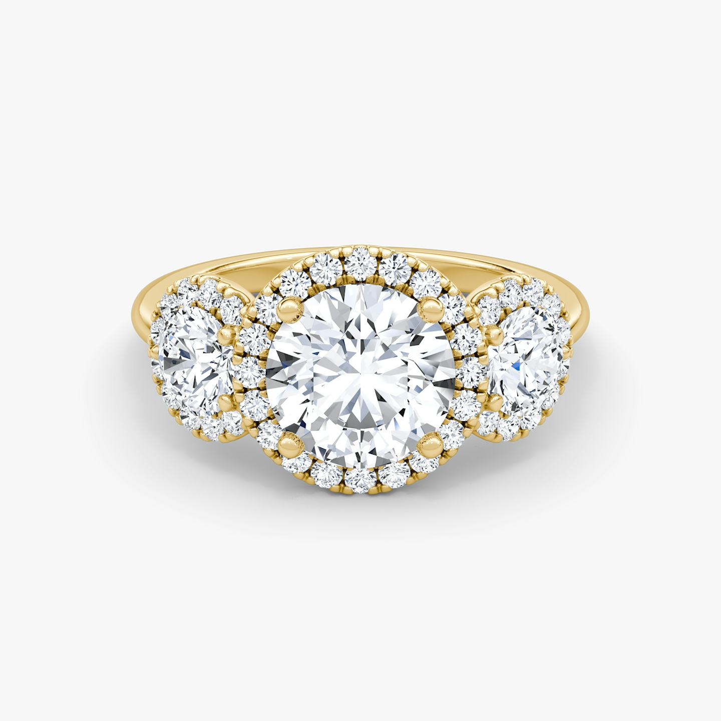 The Three Stone Halo | Round Brilliant | 18k | 18k Yellow Gold | Carat weight: See full inventory | Side stone carat: 1/4 | Diamond orientation: vertical