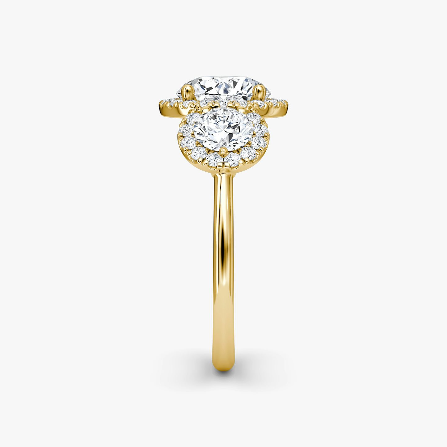 The Three Stone Halo | Round Brilliant | 18k | 18k Yellow Gold | Band: Plain | Carat weight: See full inventory | Side stone carat: 1/4 | Diamond orientation: vertical