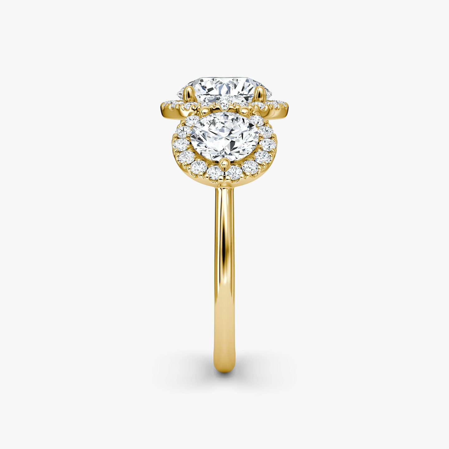 The Three Stone Halo | Round Brilliant | 18k | 18k Yellow Gold | Band: Plain | Carat weight: See full inventory | Side stone carat: 1/2 | Diamond orientation: vertical