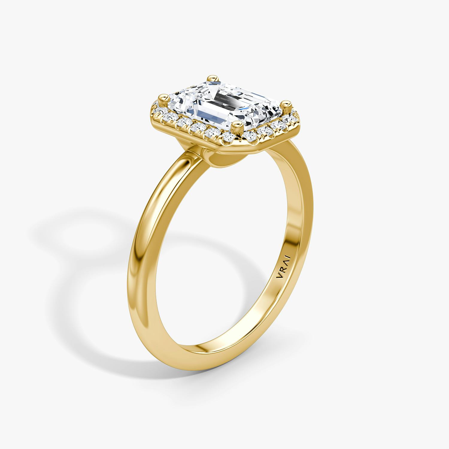 The Halo Emerald Engagement Ring in Yellow gold | VRAI
